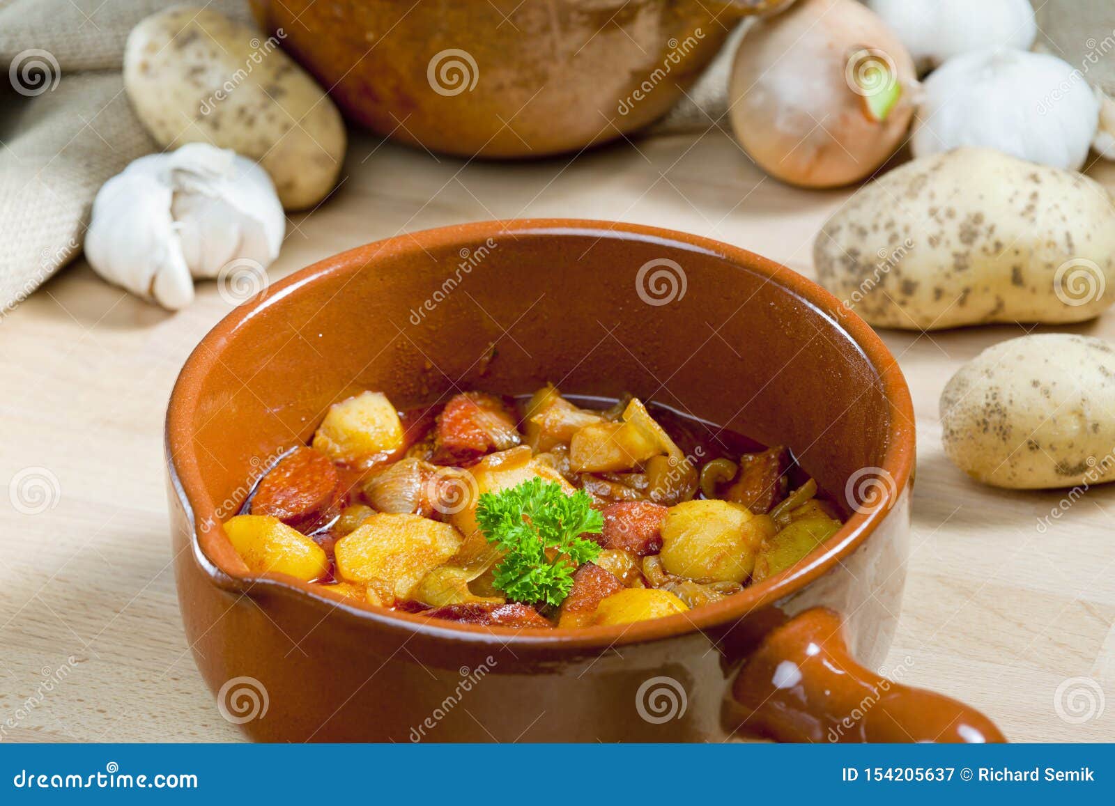 Potato and sausage goulash stock image. Image of gastronomy 154205637