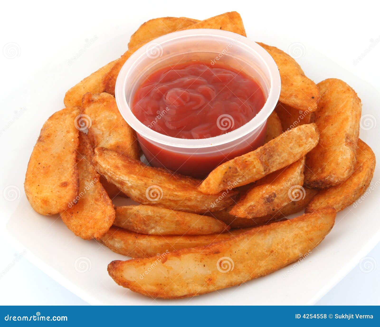 Potato wedges with ketchup stock photo. Image of tasty 4254558