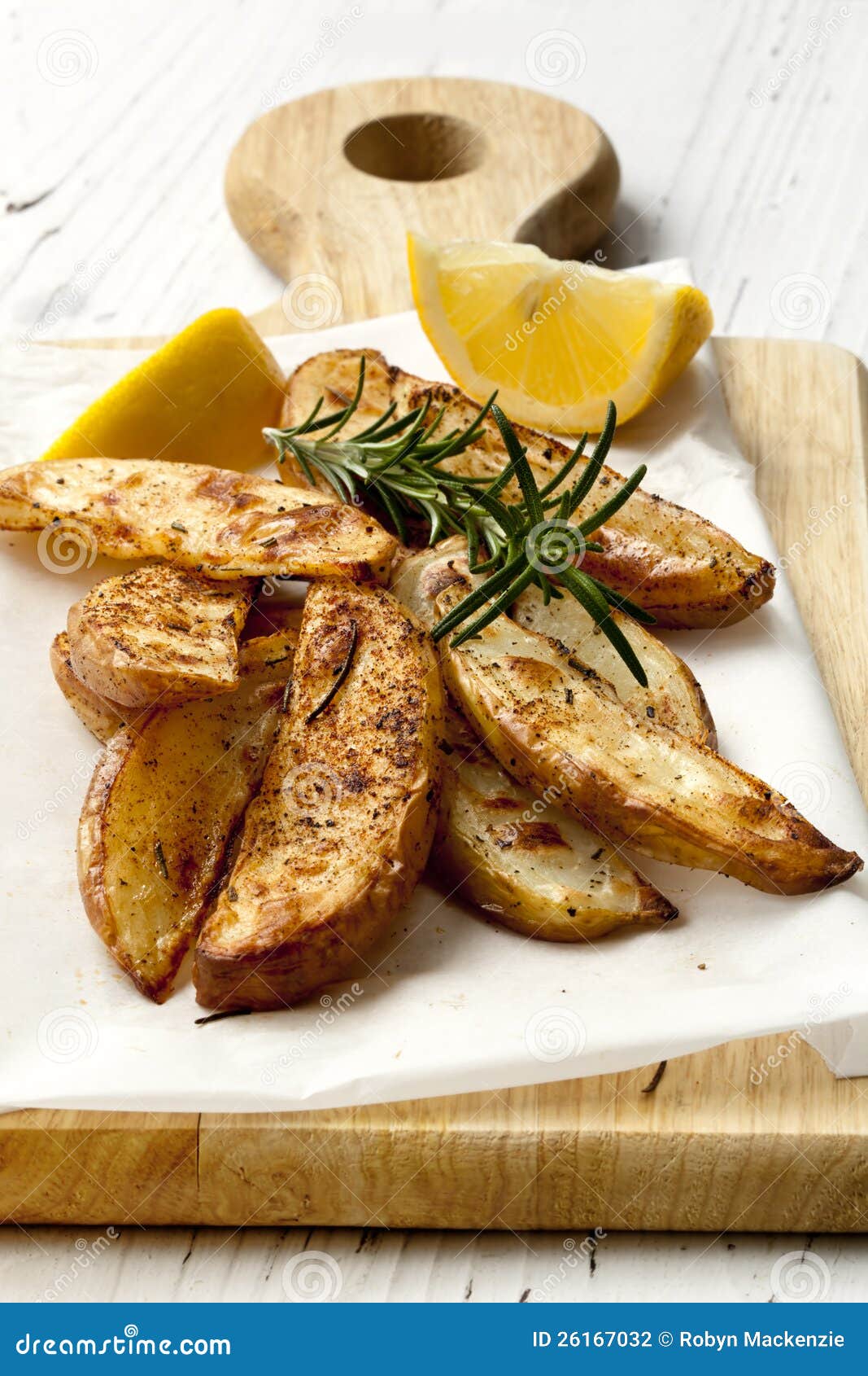 Potato Wedges with Rosemary and Lemon Stock Photo Image of paper