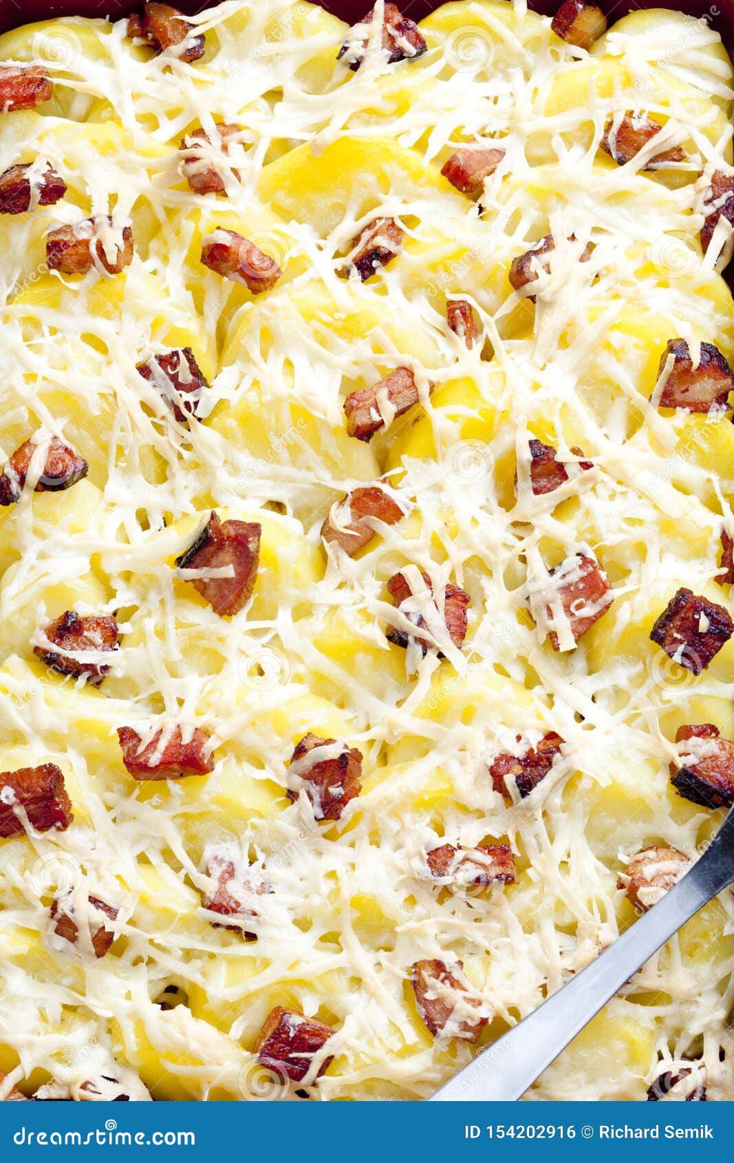 Potatoes with Bacon Baked with Pecorino Cheese Stock Photo Image of