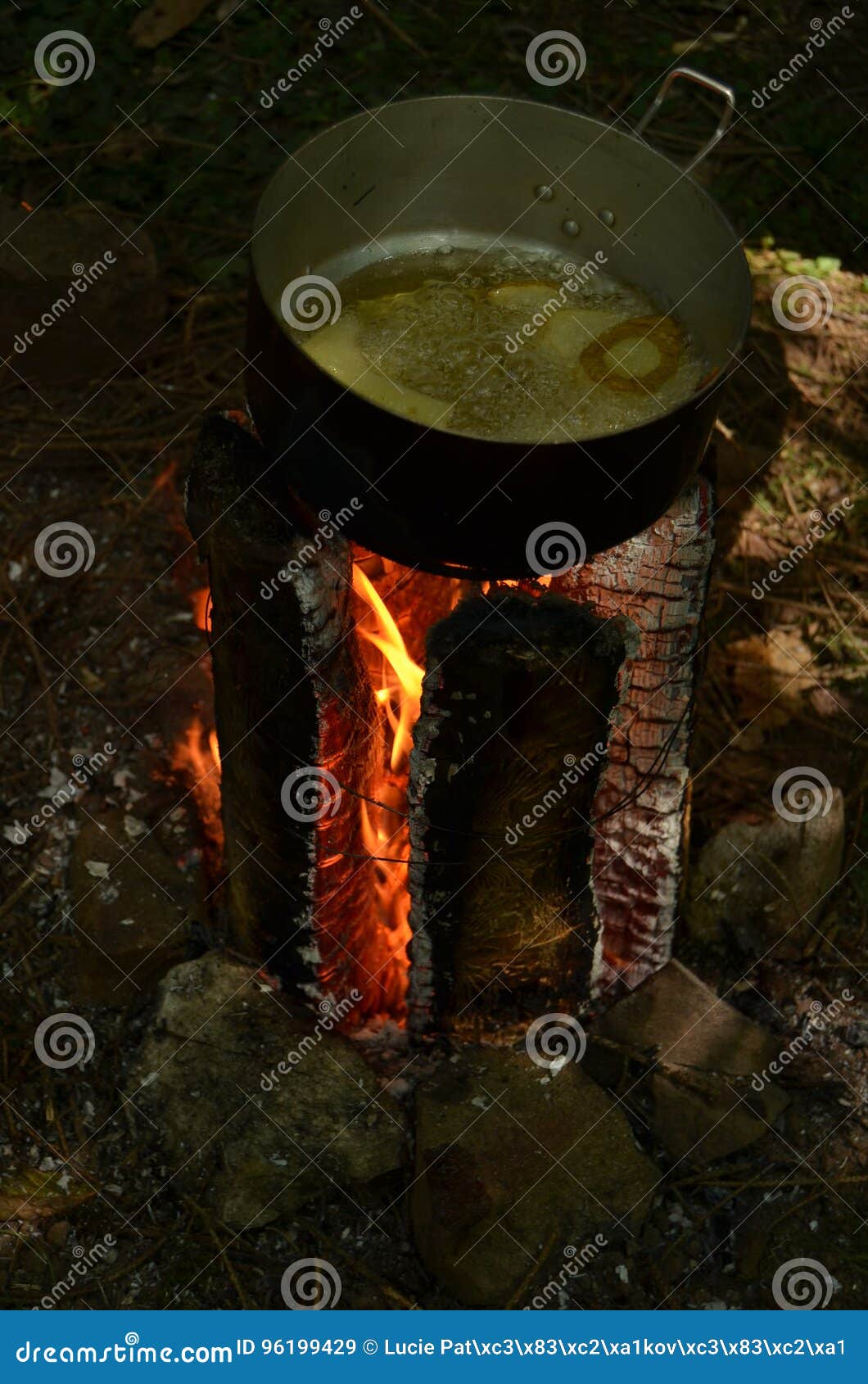 Potatoes on fire stock image. Image of light, holidays 96199429