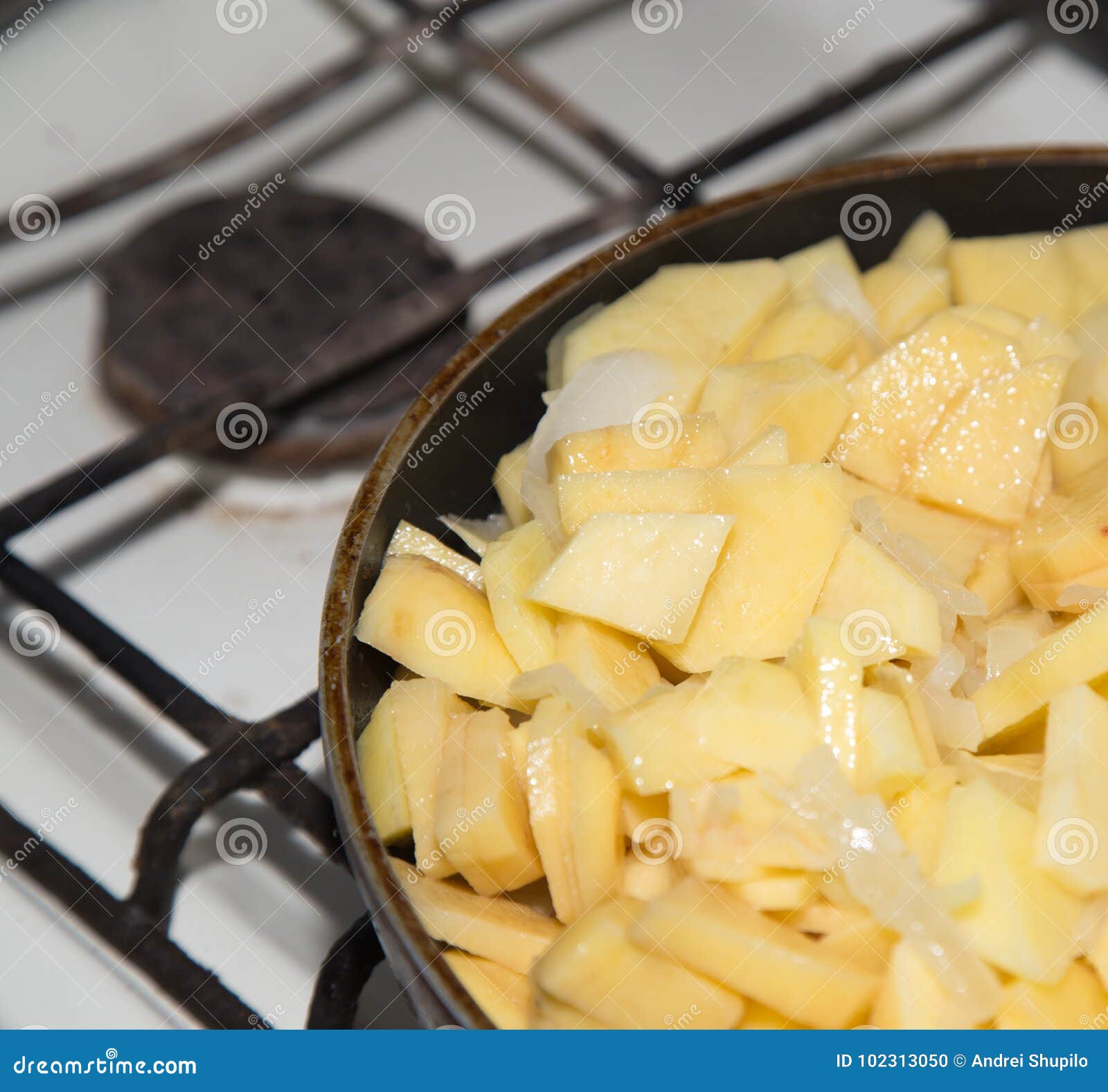 Potatoes fried in a pan stock photo. Image of roasted 102313050