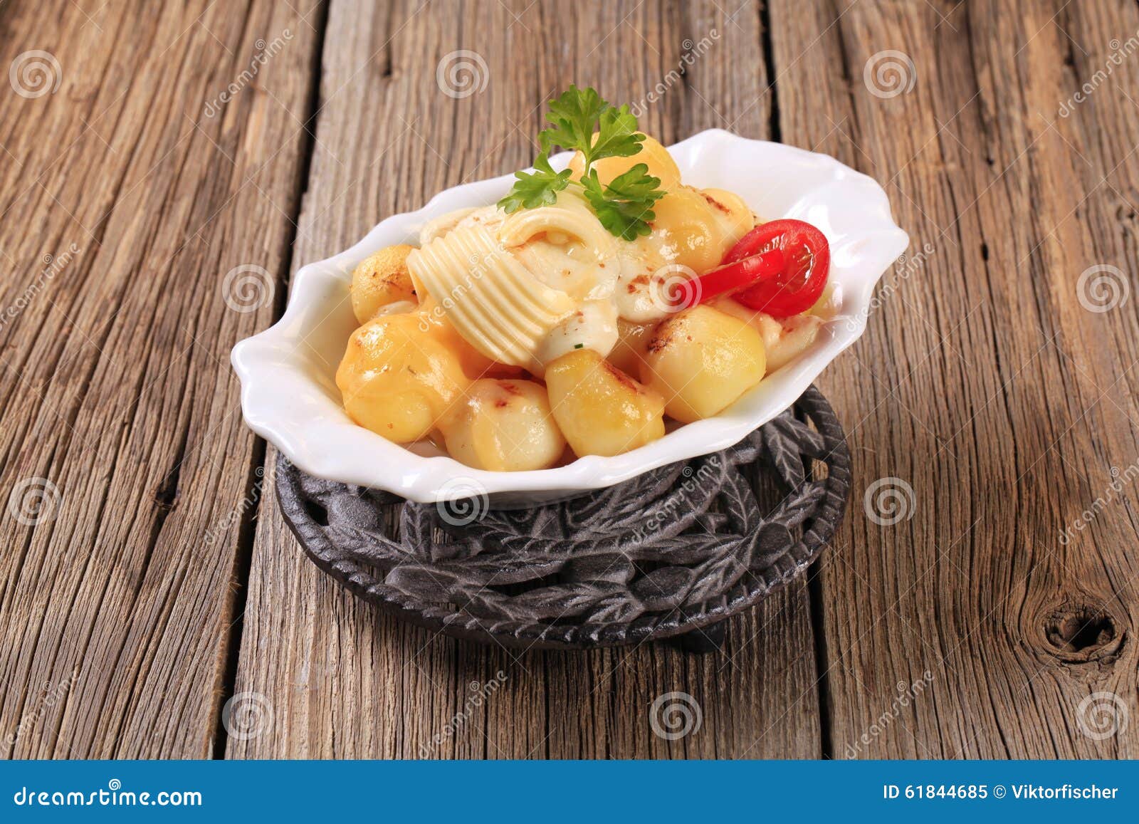 Potatoes with Mozzarella Cheese Stock Image - Image of bowl, roasted