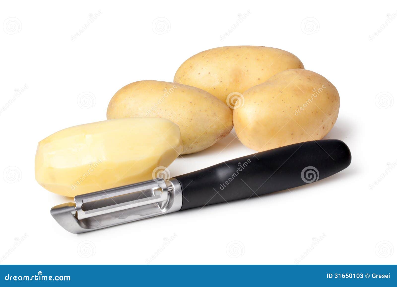 potatoes and peeler
