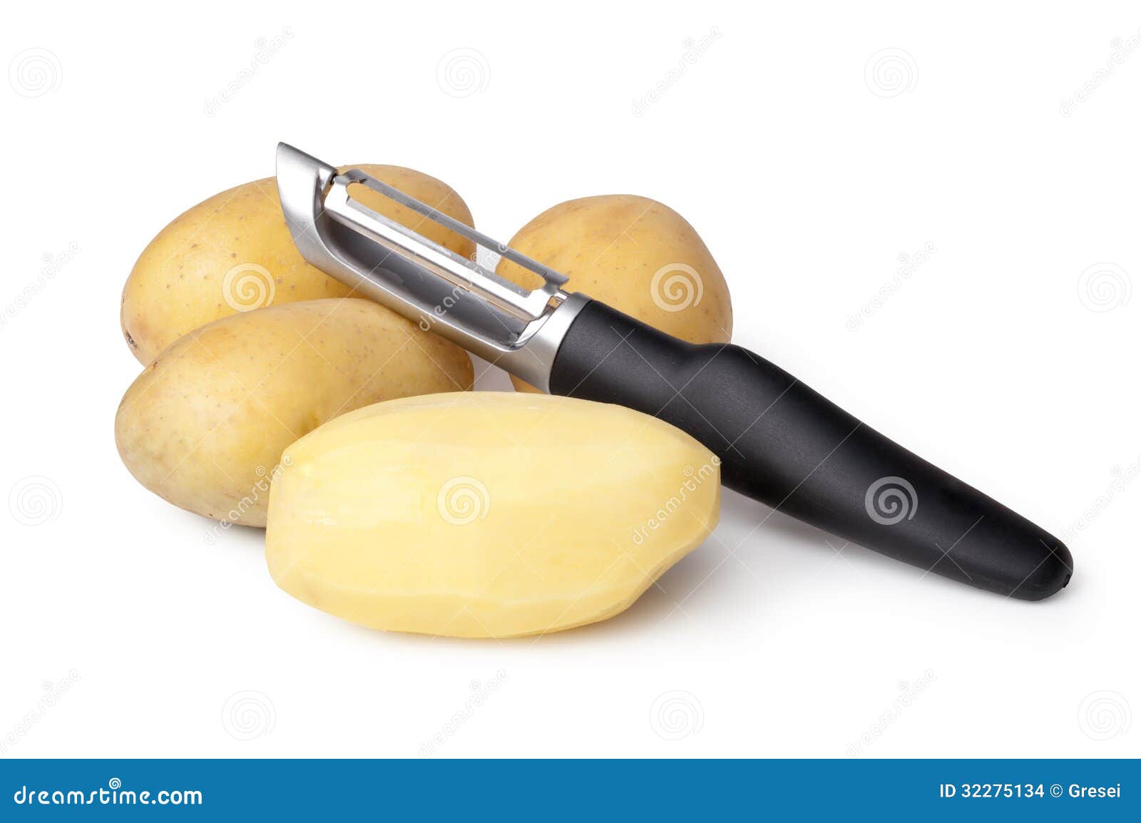potatoes and peeler
