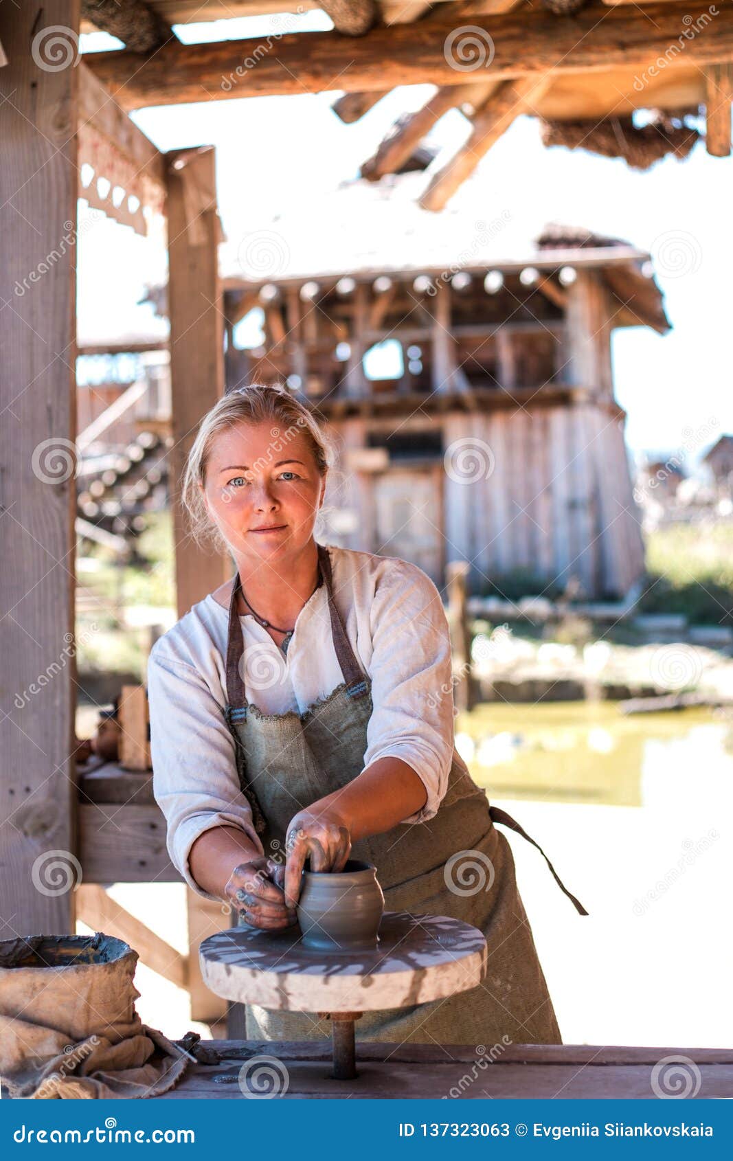 Potter is Creating Earthenware on Potter`s Wheel. Stock Image Image