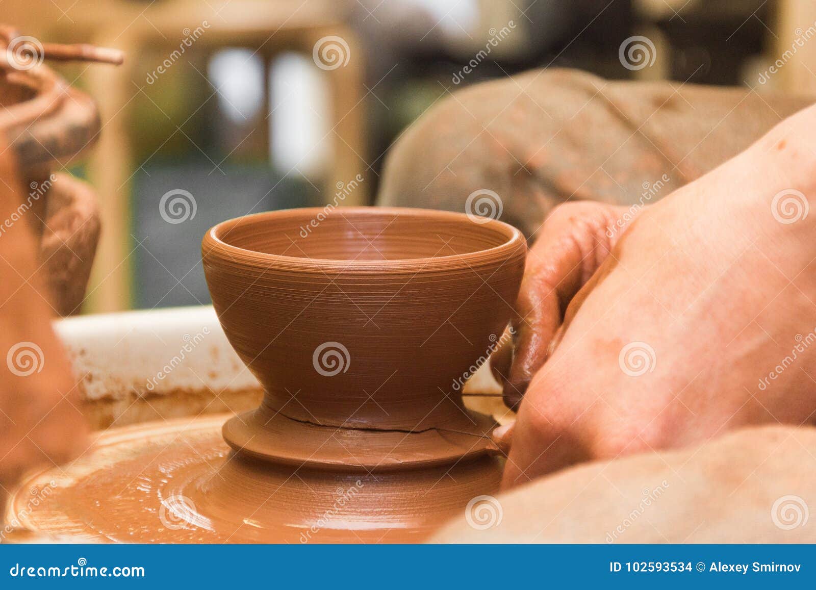 Potter doing his work stock photo. Image of pottery 102593534