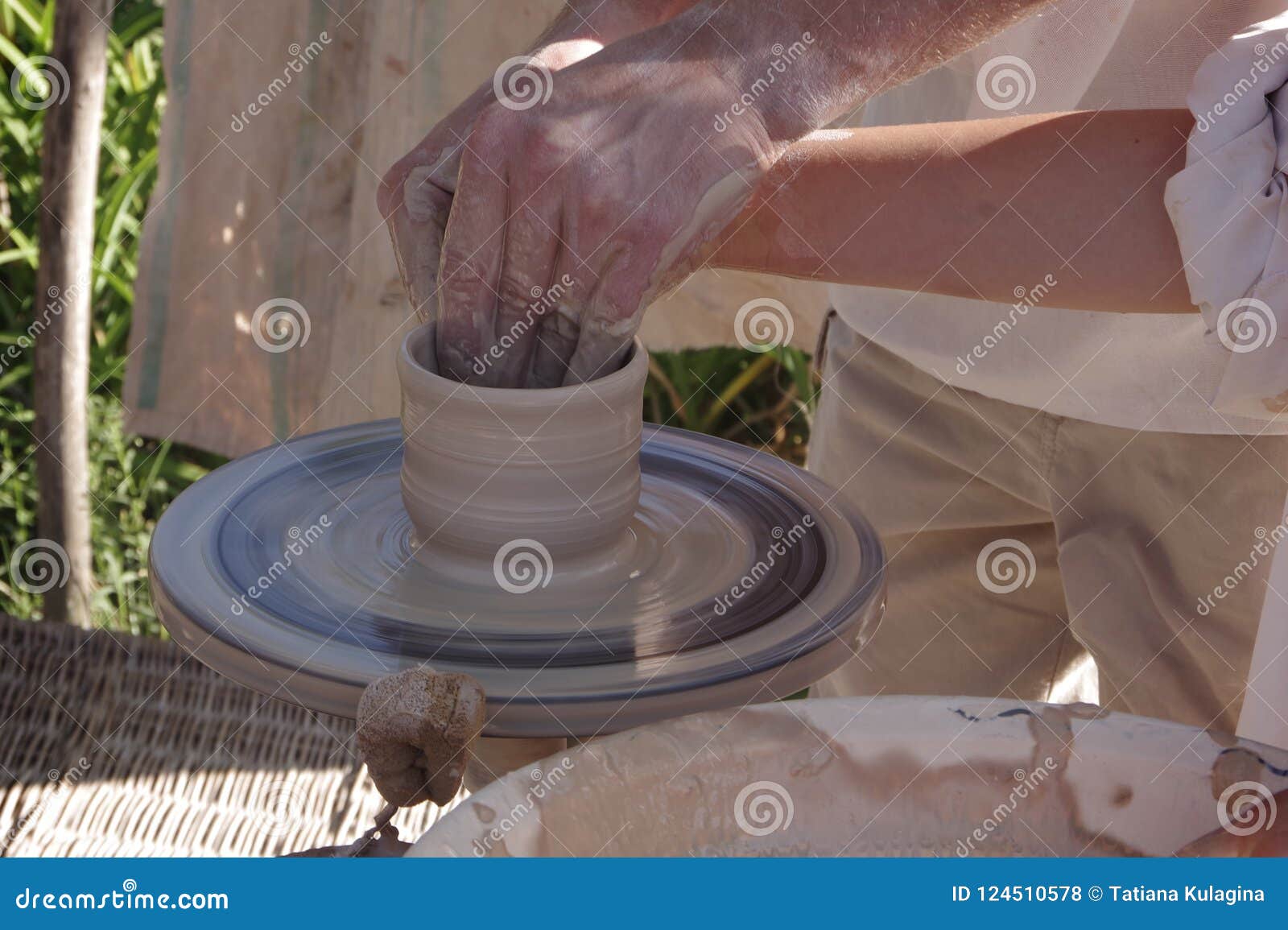 Potter`s wheel with clay. stock photo. Image of artisan 124510578