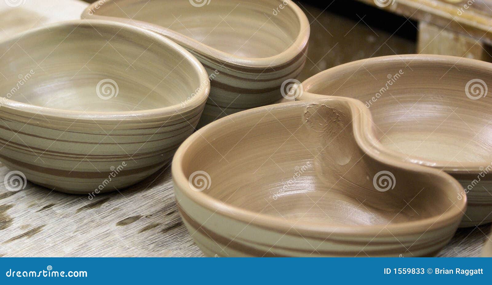 Potters freshly made bowls stock image. Image of throw 1559833