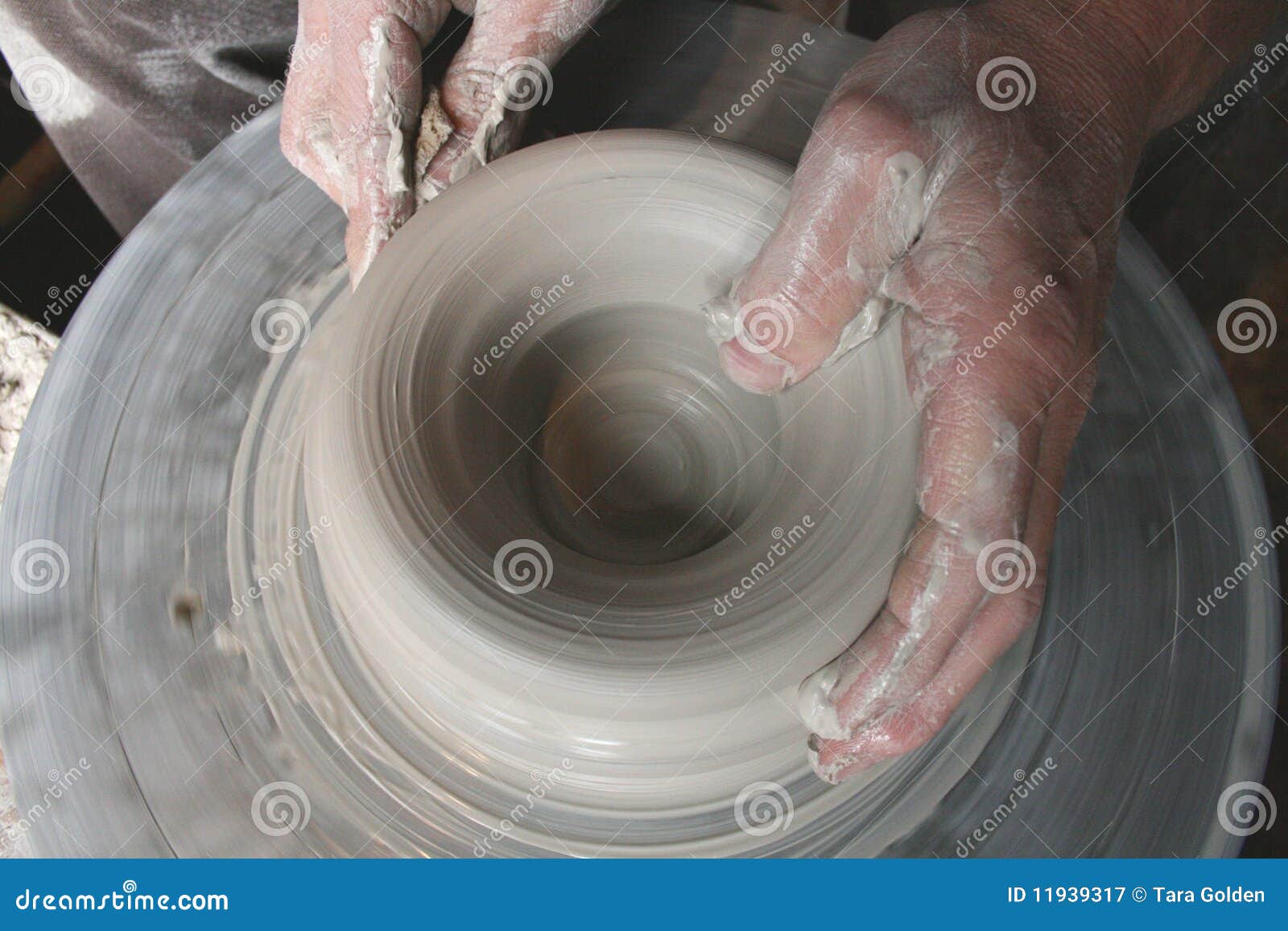 Potters hands on wheel stock image. Image of dishware 11939317