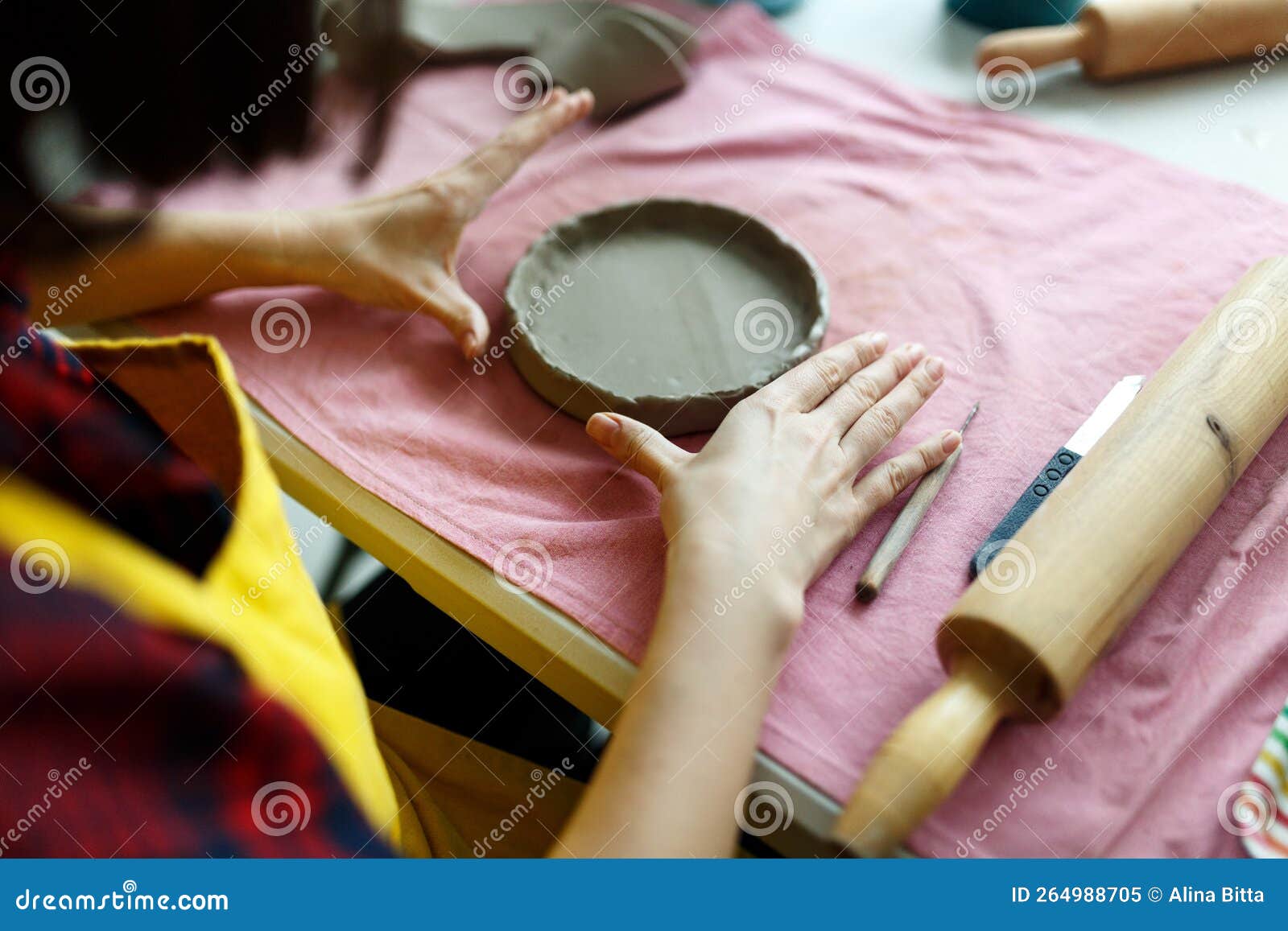 Pottery Class. a Pottery Crafts Dish from a Raw Clay Stock
