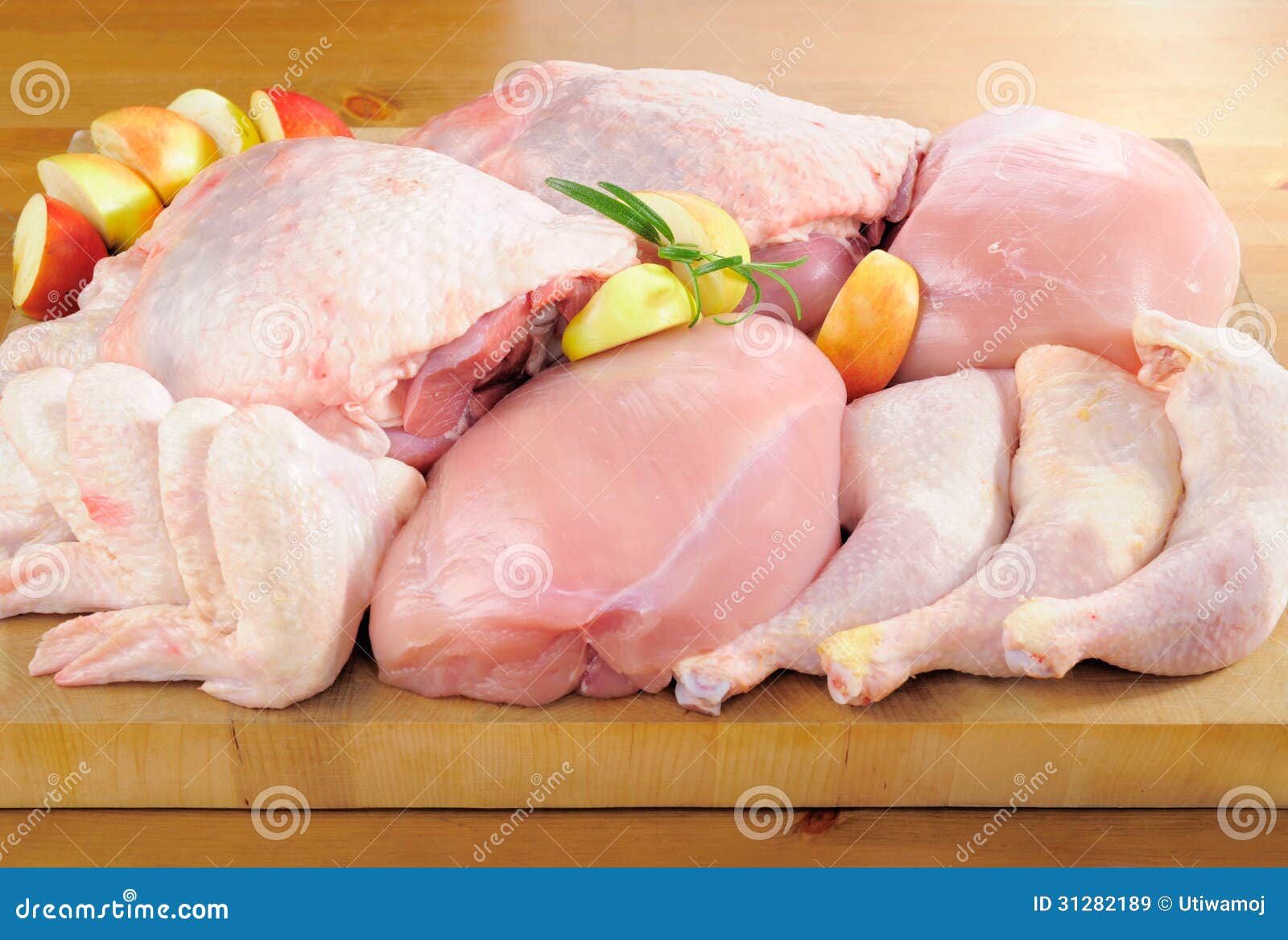 poultry meat arrangement on kitchen board