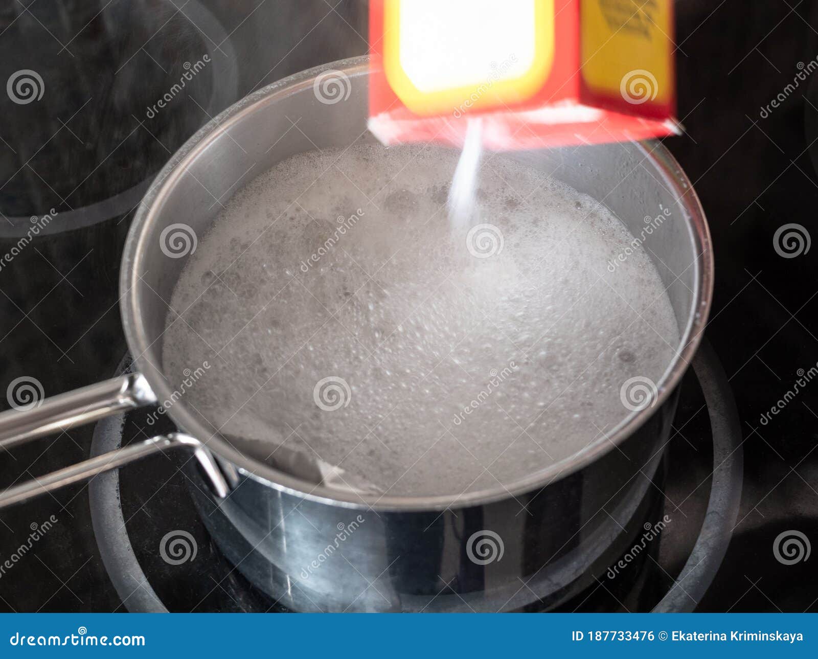 Pour Baking Soda Into Pot With Boiling Water Stock Photo Image of