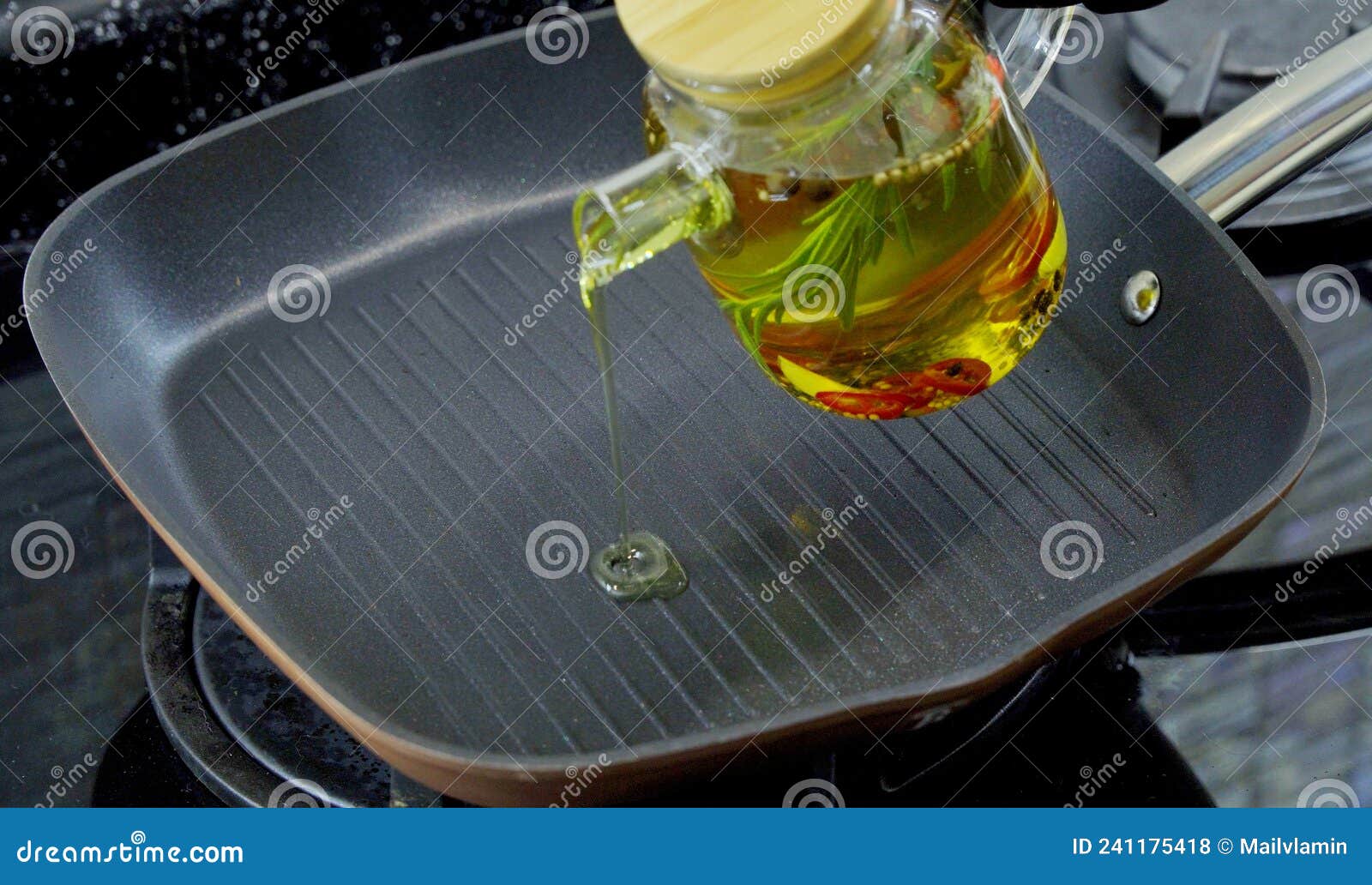 Pour Olive Oil into a Frying Pan. Stock Photo Image of dish, lighting 241175418