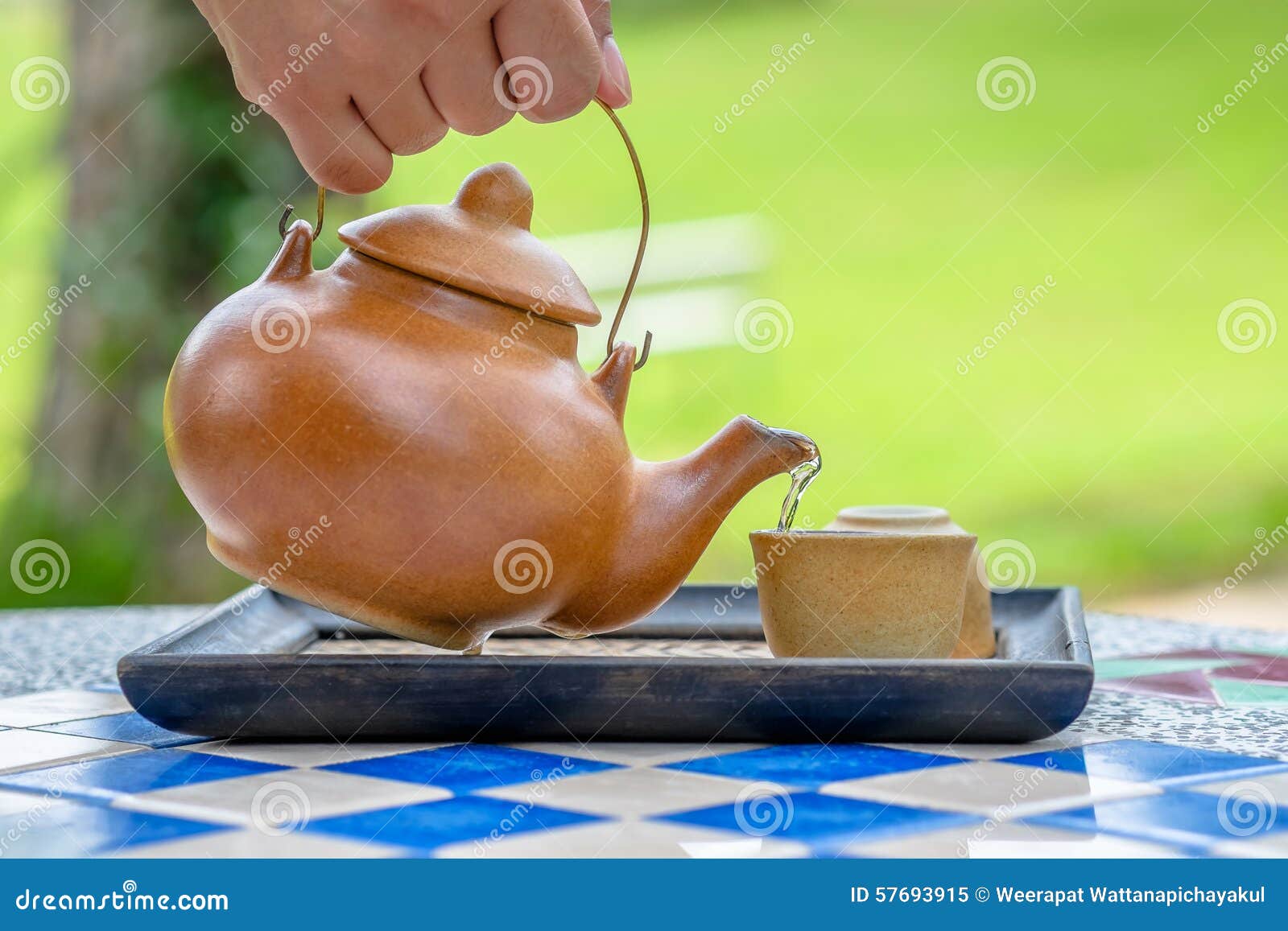 Pour tea stock image. Image of brown, garden, gourmet 57693915