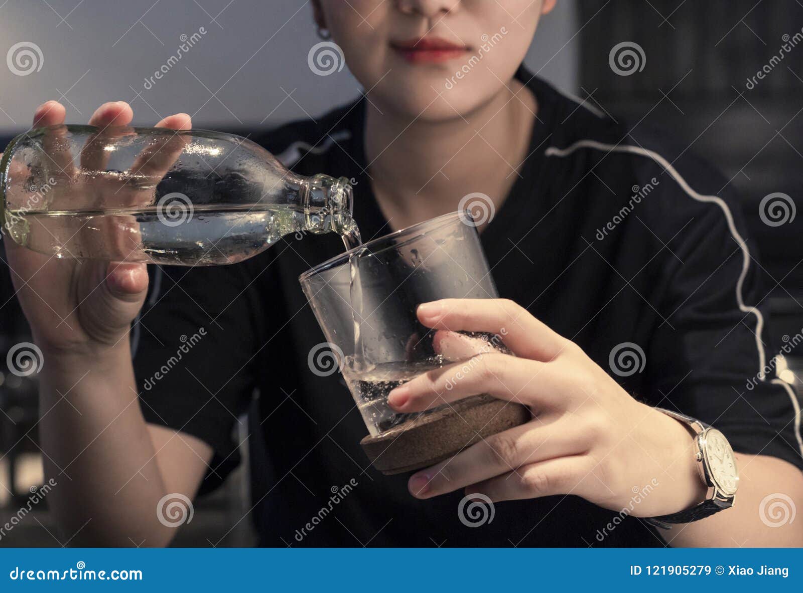 Pour water into a cup stock image. Image of asia, china 121905279