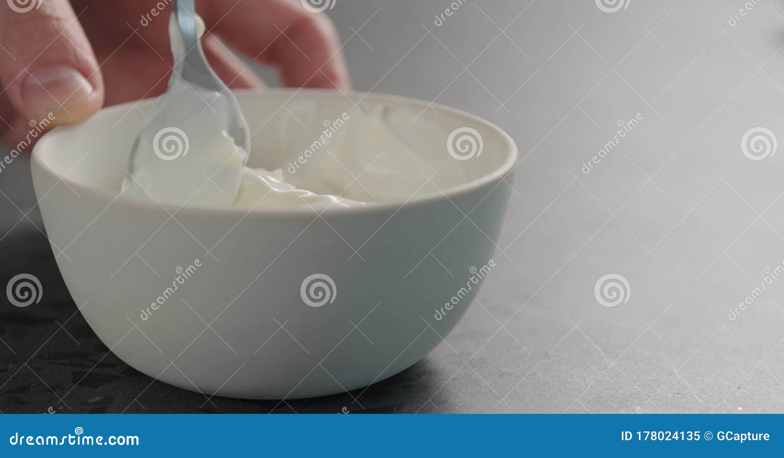 Pour White Yogurt in White Bowl on Concrete Surface Stock Image Image