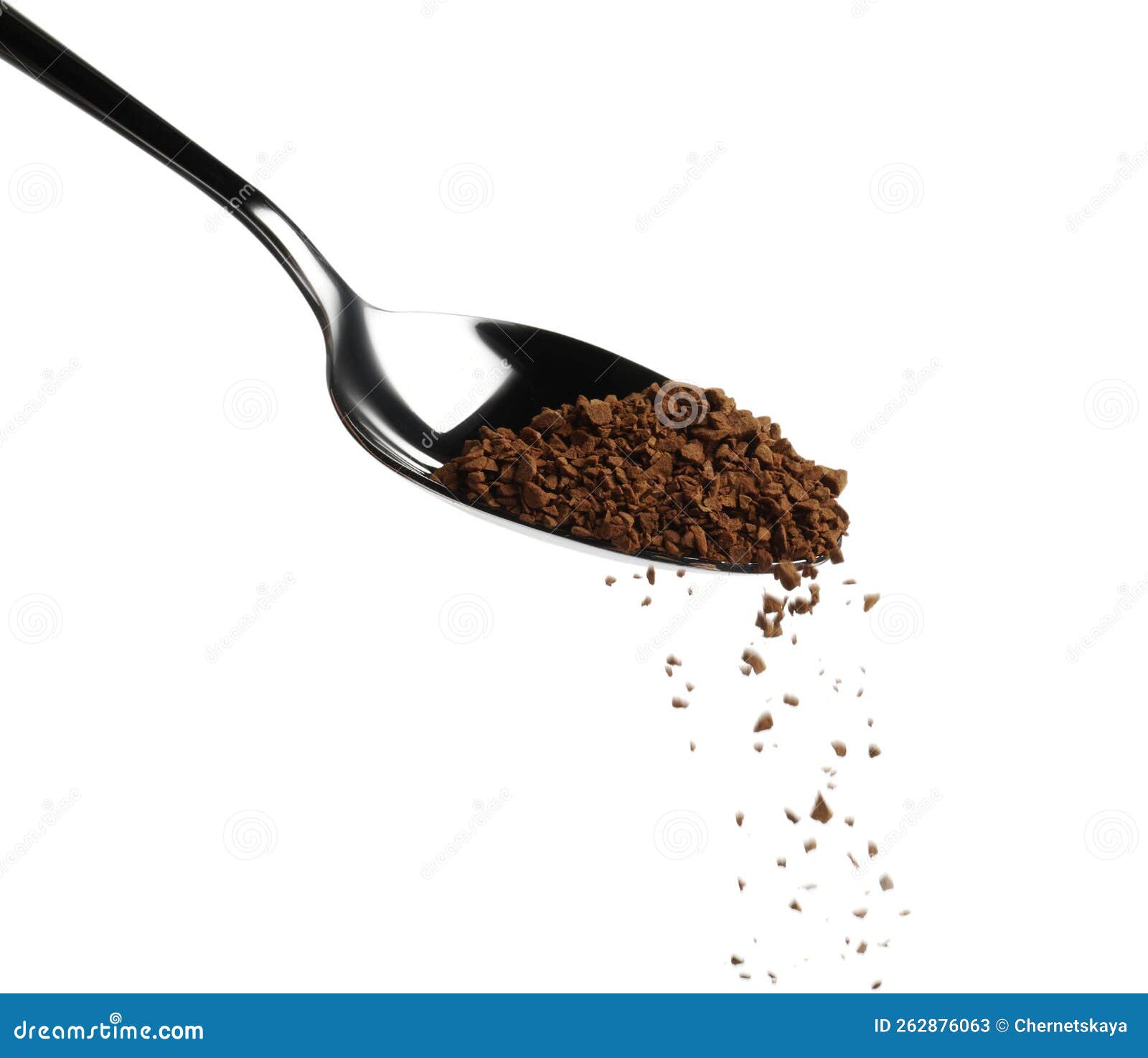 Pouring Aromatic Instant Coffee from Spoon on White Background Stock