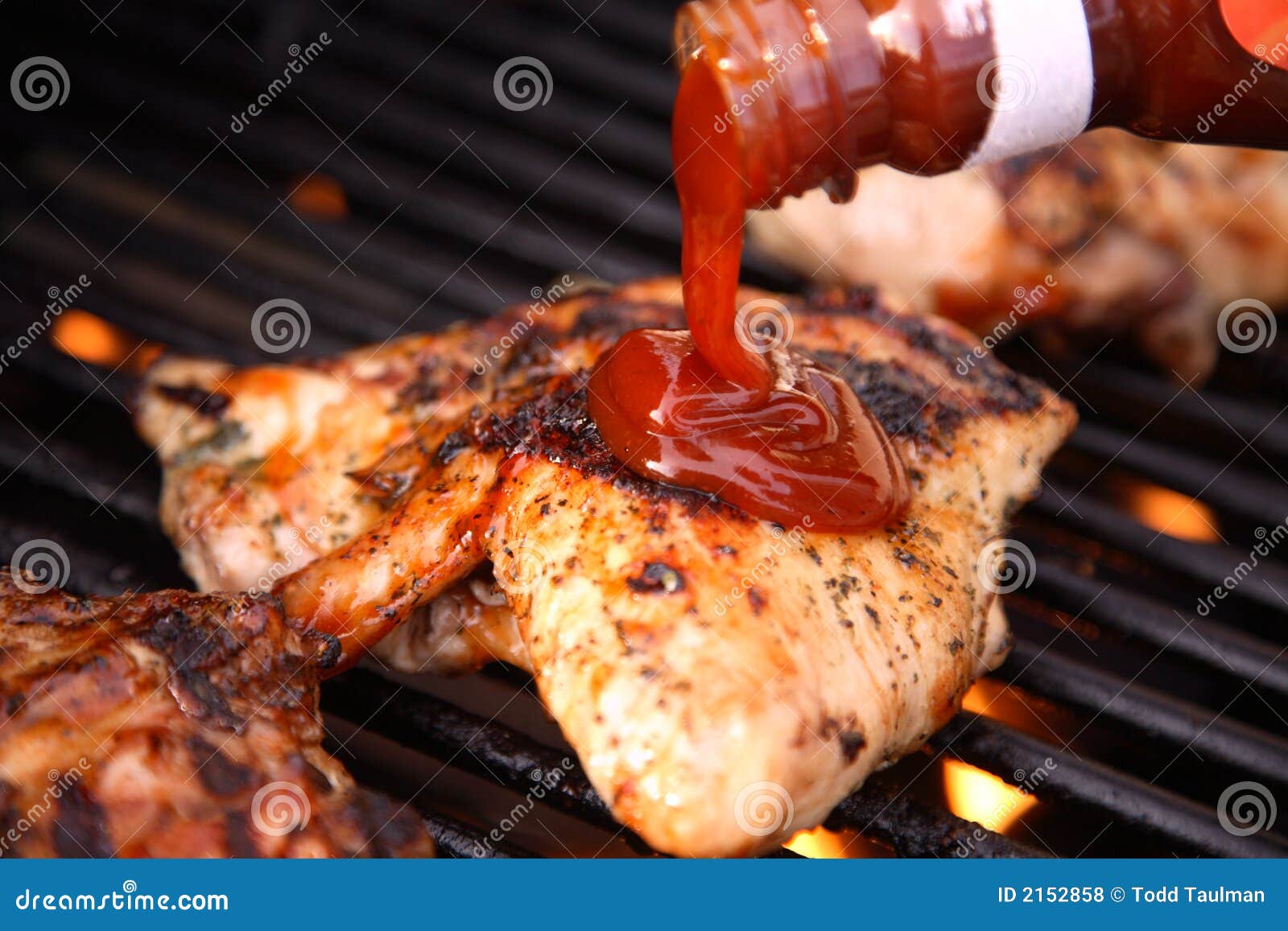 pouring barbeques sauce on chi