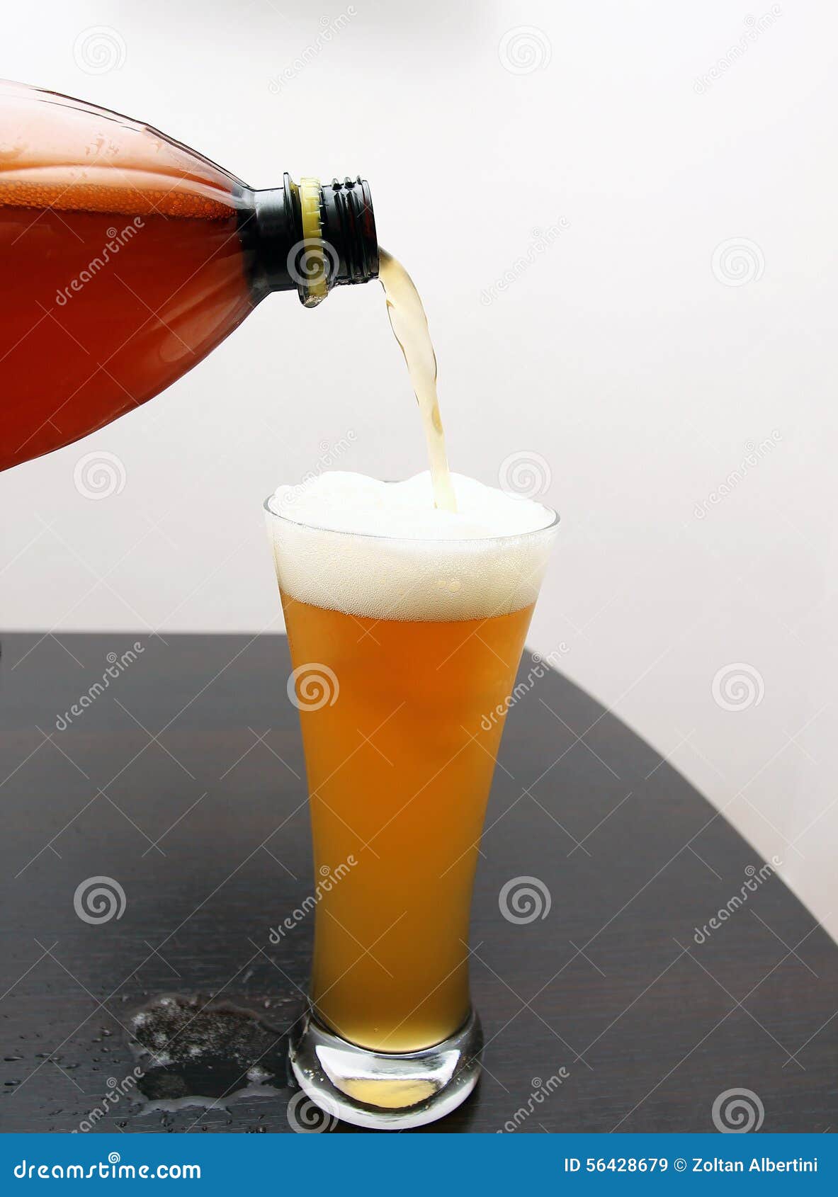 Pouring beer stock image. Image of flow, bubbles, brewing 56428679