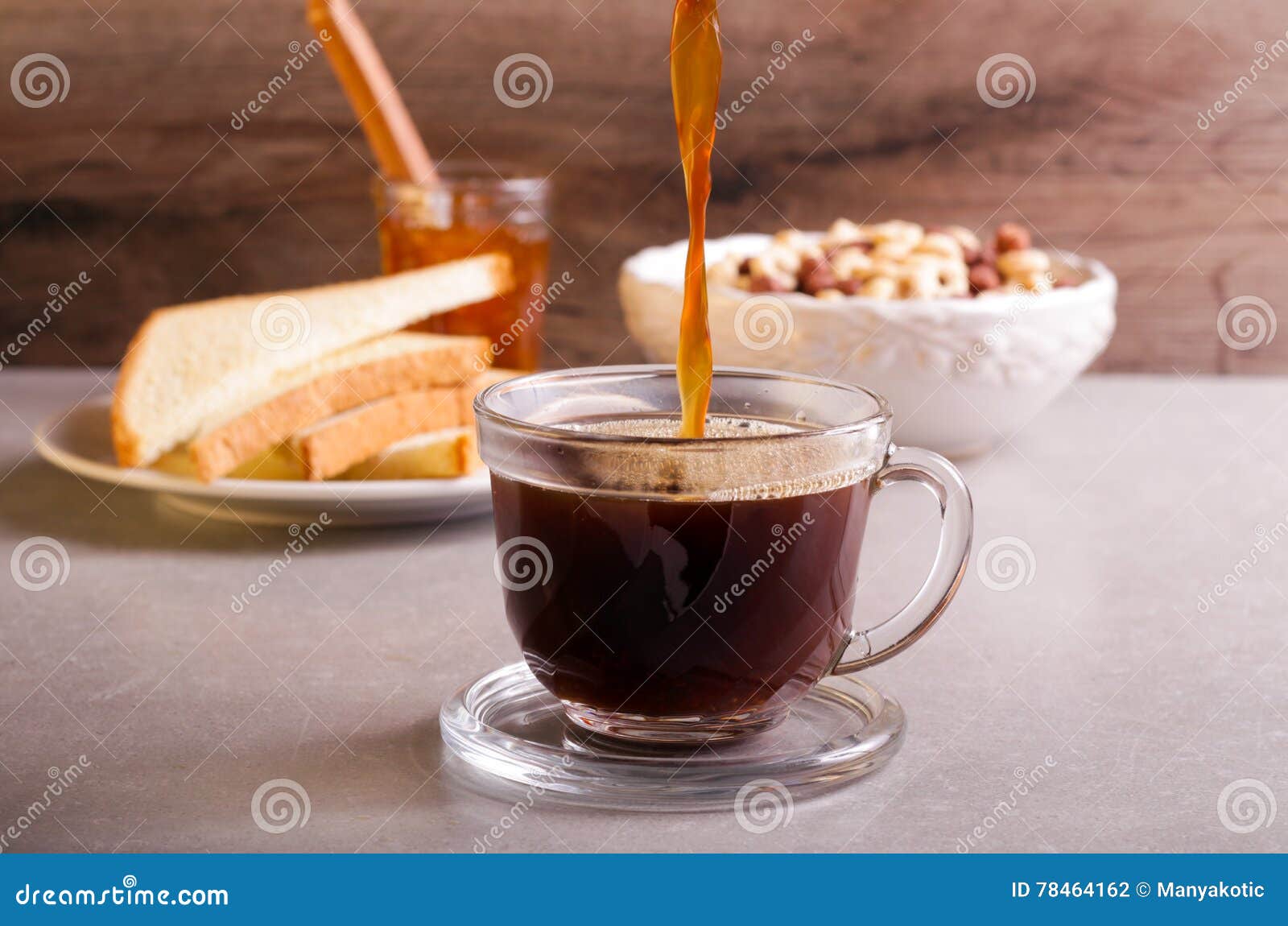 Pouring coffee in a glass stock photo. Image of rustic 78464162