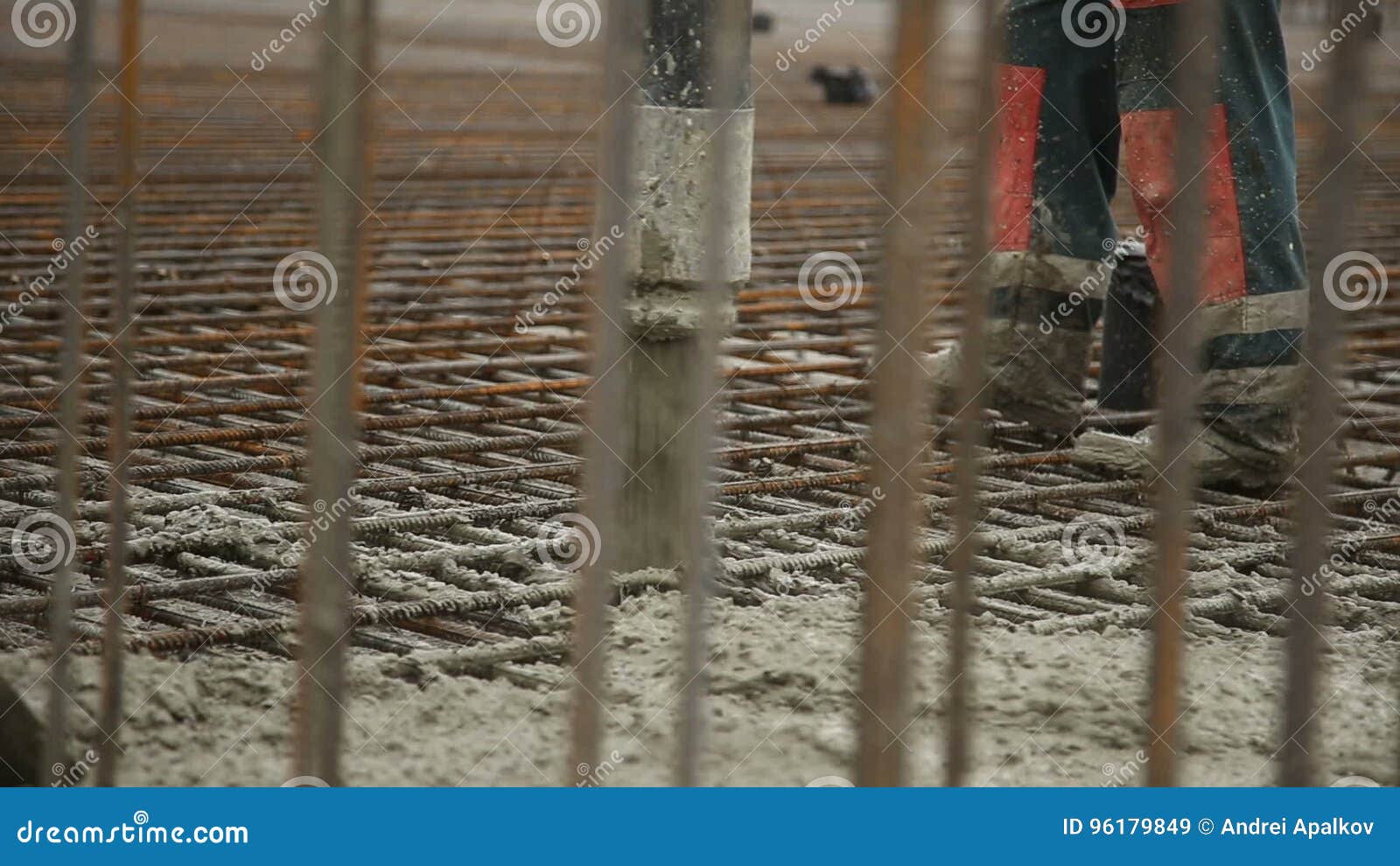 Pouring Concrete Mix From Cement Mixer On Concreting Formwork