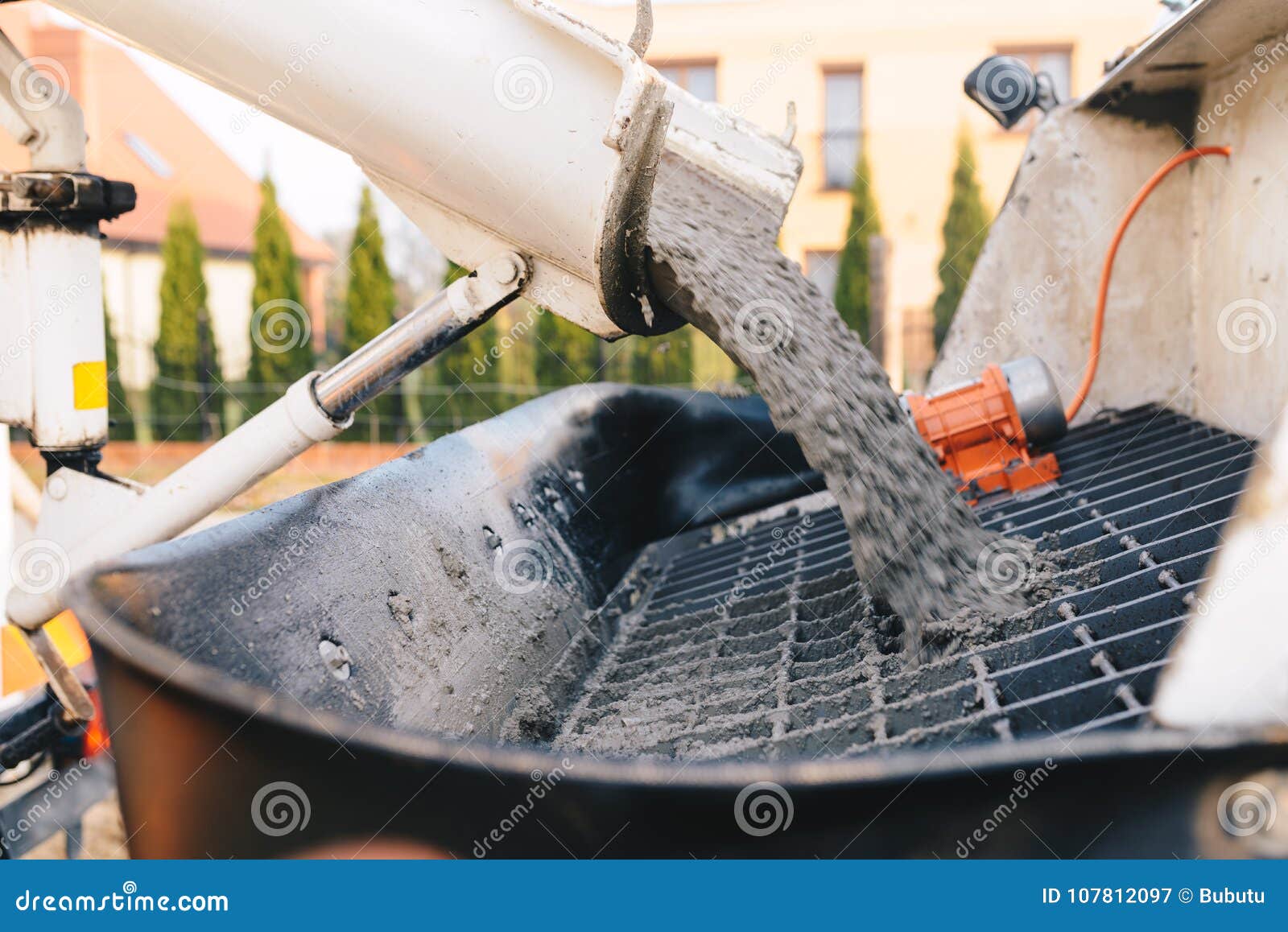 Pouring Concrete from a Concrete Mixer To the Pump Pouring Con Stock