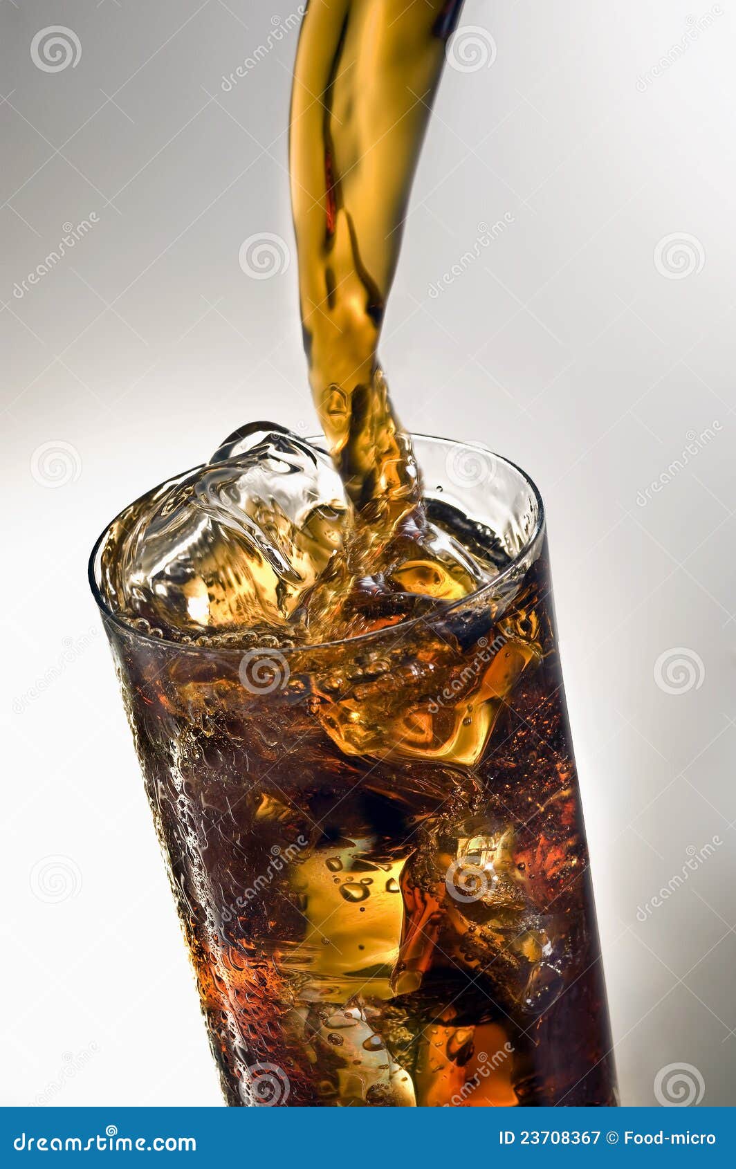 Cold Fizzy Cola Soda With Ice In Glass Cup Stock Photo - Download