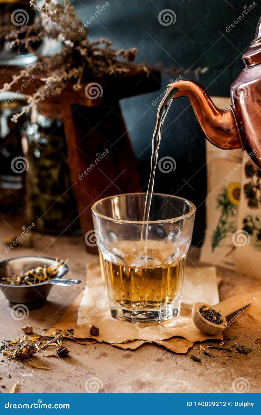 Pouring Herbal Tea stock photo. Image of flower, melissa - 140009212