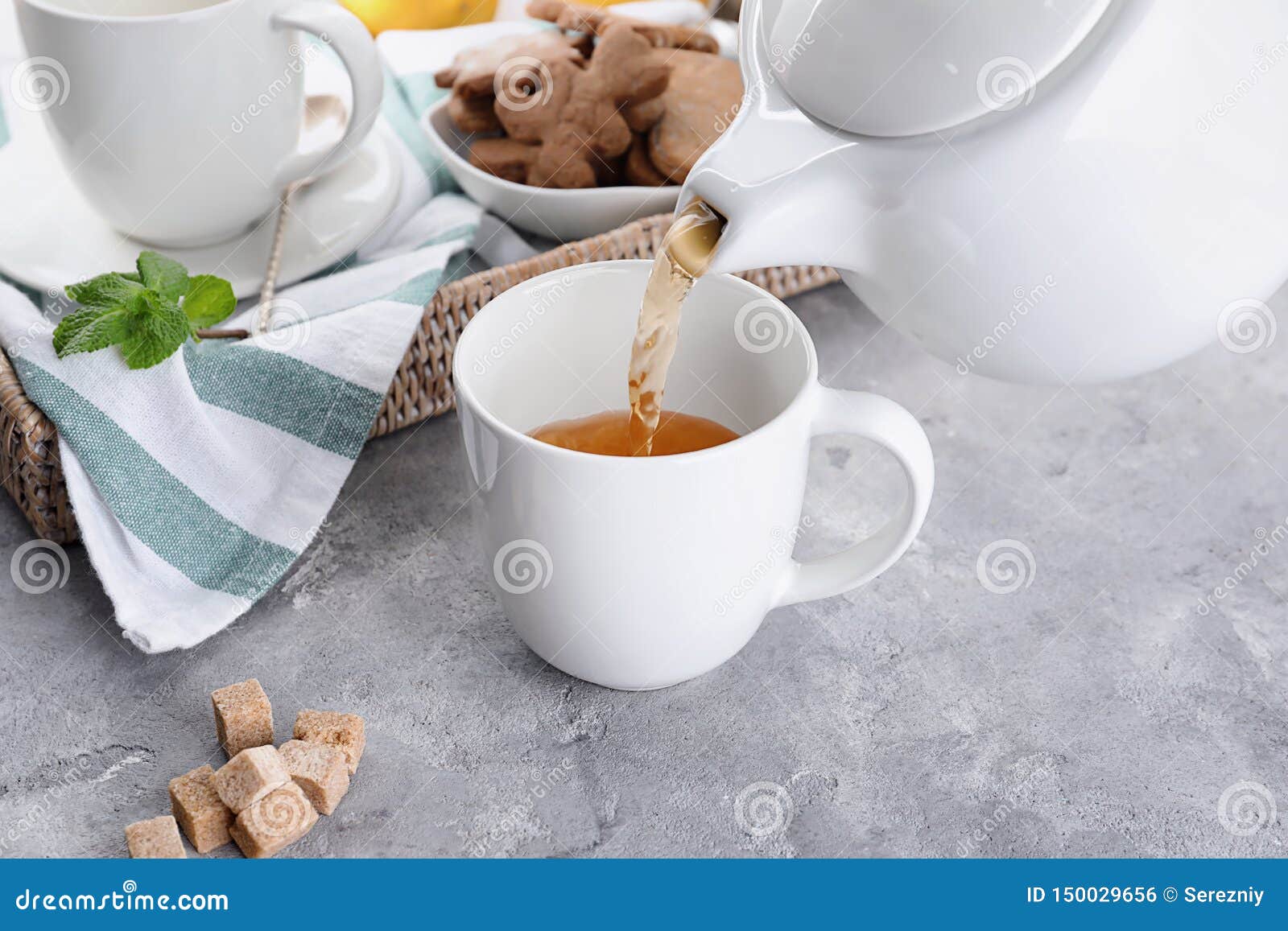 Pouring Hot Tea into Cup on Table Stock Photo Image of aromatic, delicious 150029656