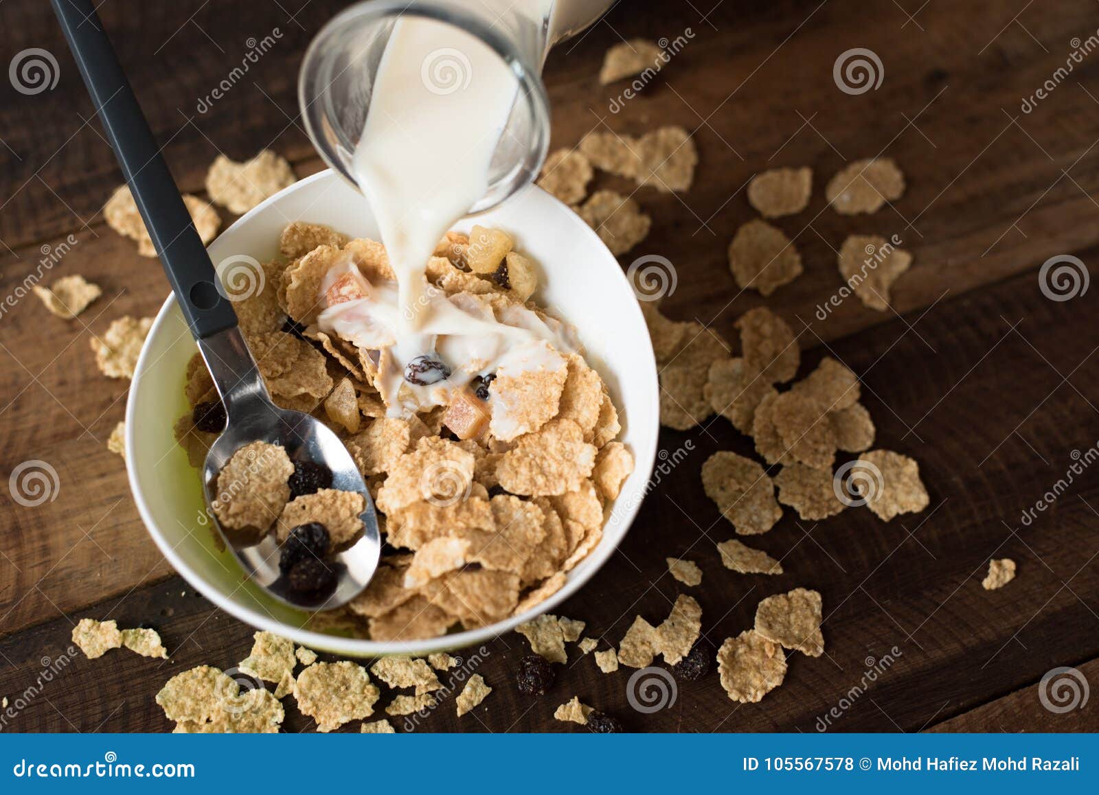 Pouring Milk Into Breakfast Cereal Cornflakes Stock Photography ...