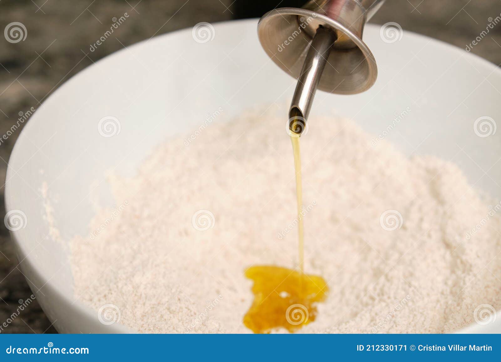 Pouring Olive Oil on Flour for a Bread Dough Stock Image Image of