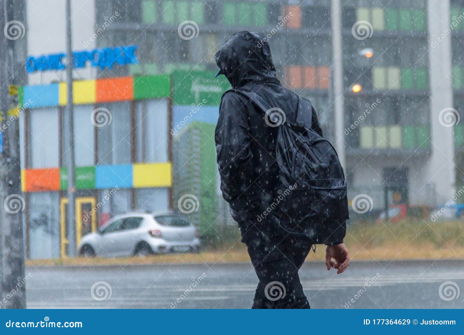 walking in the rain without an umbrella