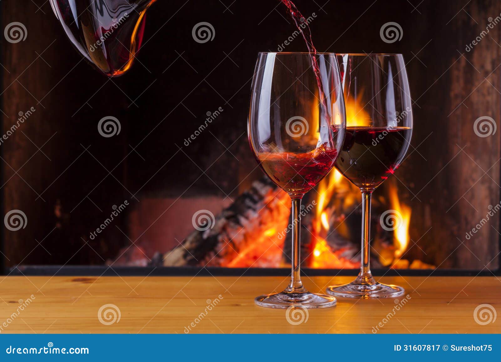 Pouring Red Wine At Cozy Fireplace Stock Image - Image of decanter, fireplace: 31607817