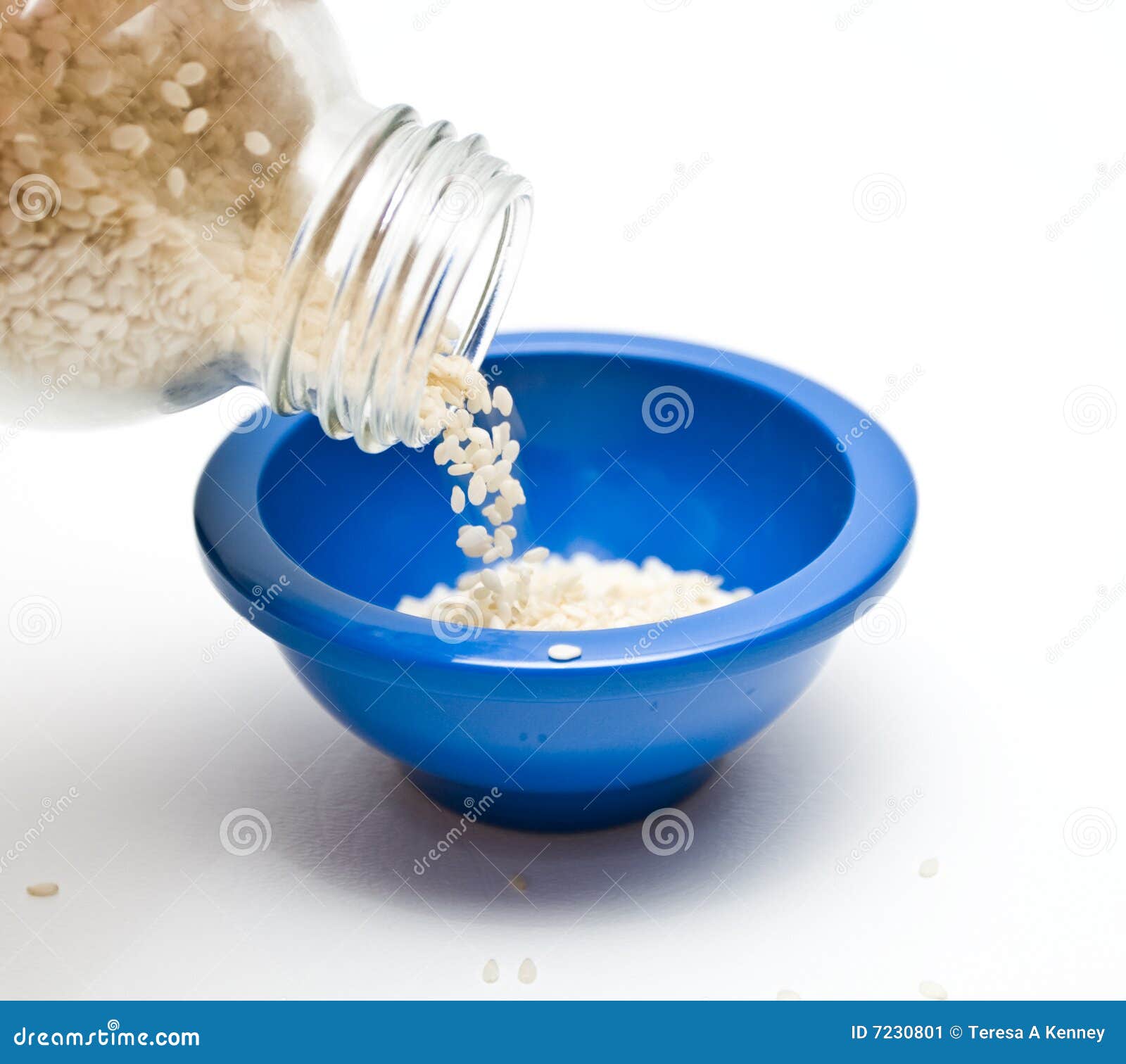 Pouring Sesame Seeds stock image. Image of container, glass 7230801
