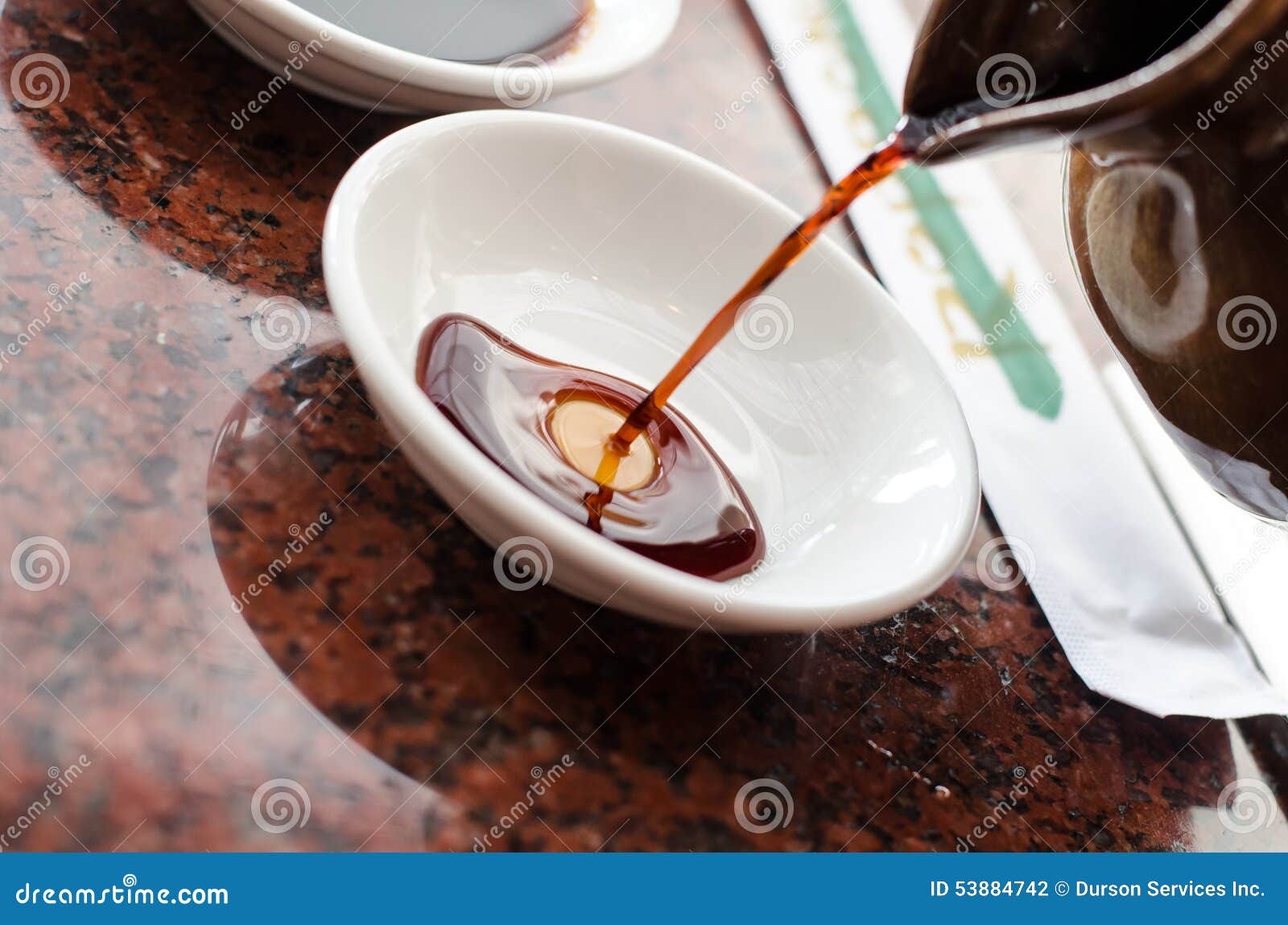 Pouring soy sauce stock photo. Image of restaurant, hungry 53884742