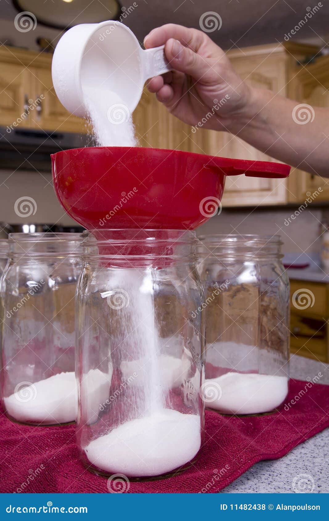Pouring Sugar in Jar from Measuring Cup Stock Photo Image of bottle