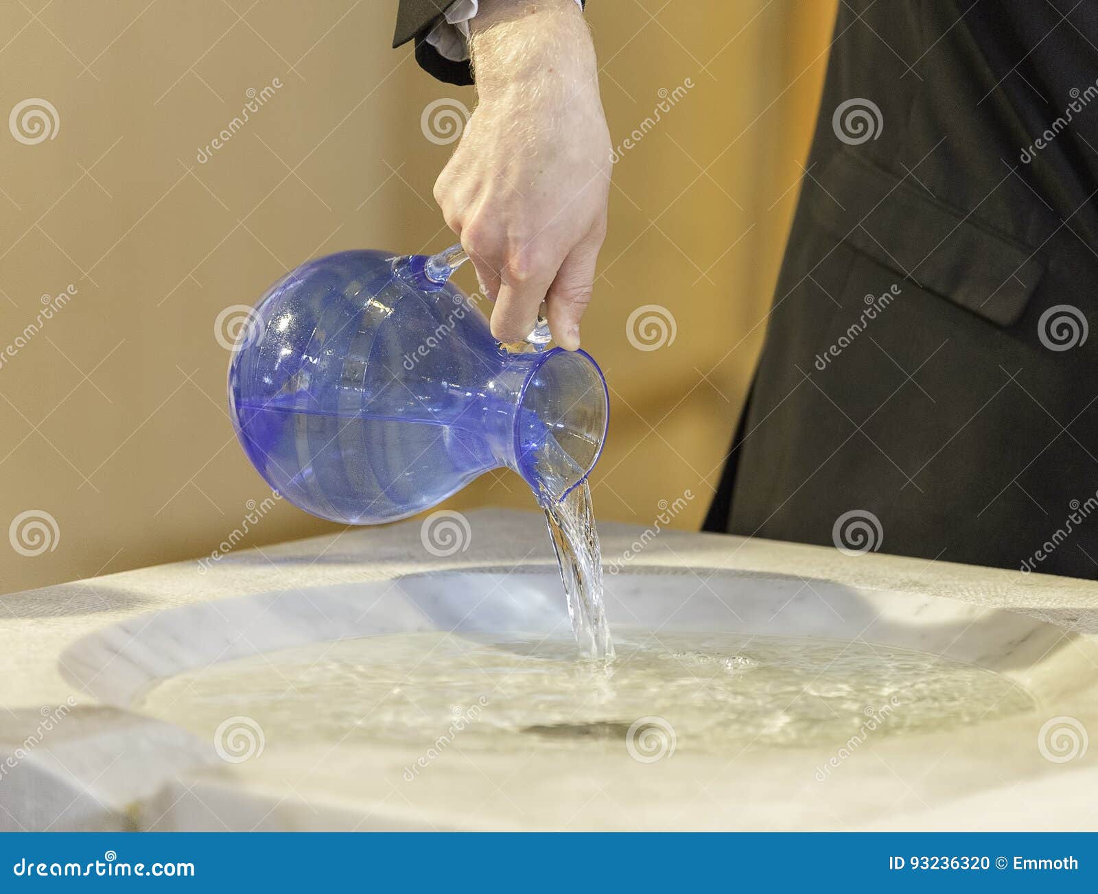 Pouring Water into Baptismal Font Stock Photo Image of glass, water