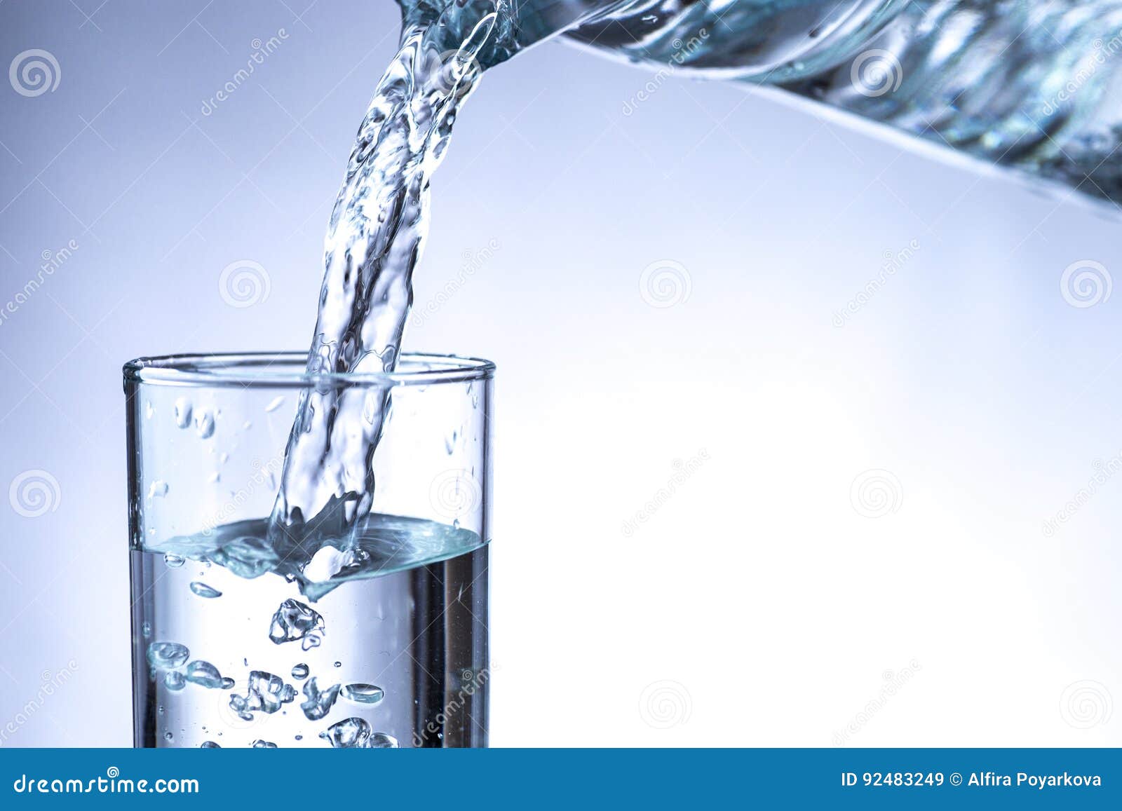 Water pouring into a pitcher. Stock Photo by ©jurisam 84820504