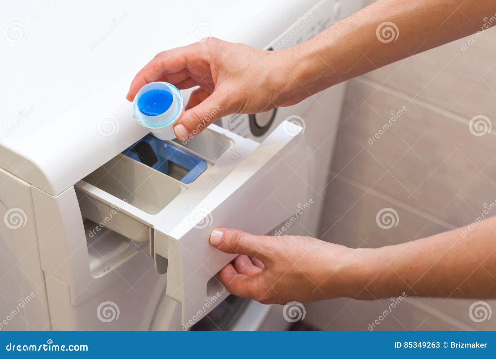 She Pours the Liquid Powder in Washing Machine. Stock Image Image of