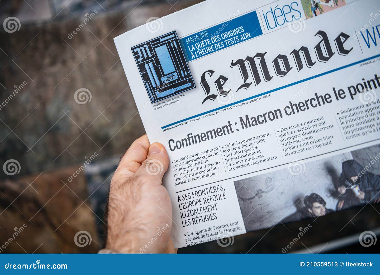 POV Male Hand Holding Reading French Le Monde Newspaper with Lockdown Editorial Stock Photo - Image of journal, business: 210559513