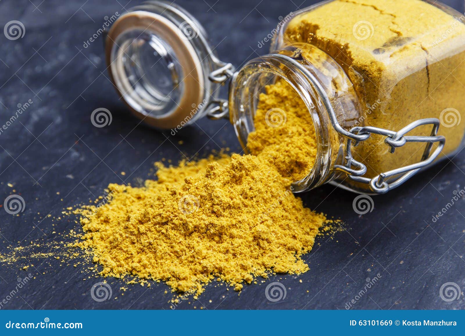 Powder Seasoning Spice Turmeric on a Black Stone Stock Image Image of flavor, medicine 63101669