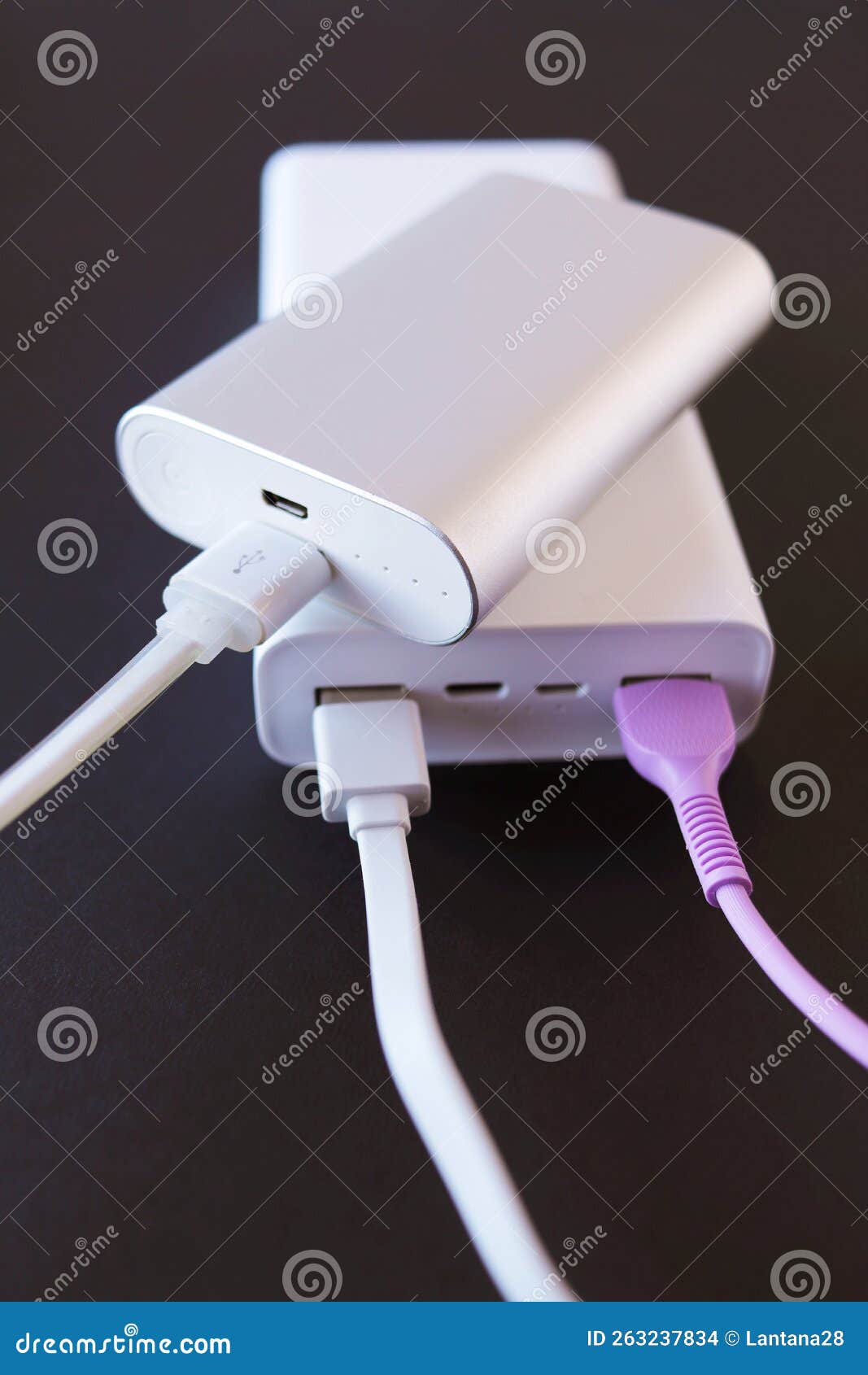 Power Bank, External Battery and Usb Wire on the Table, Universal