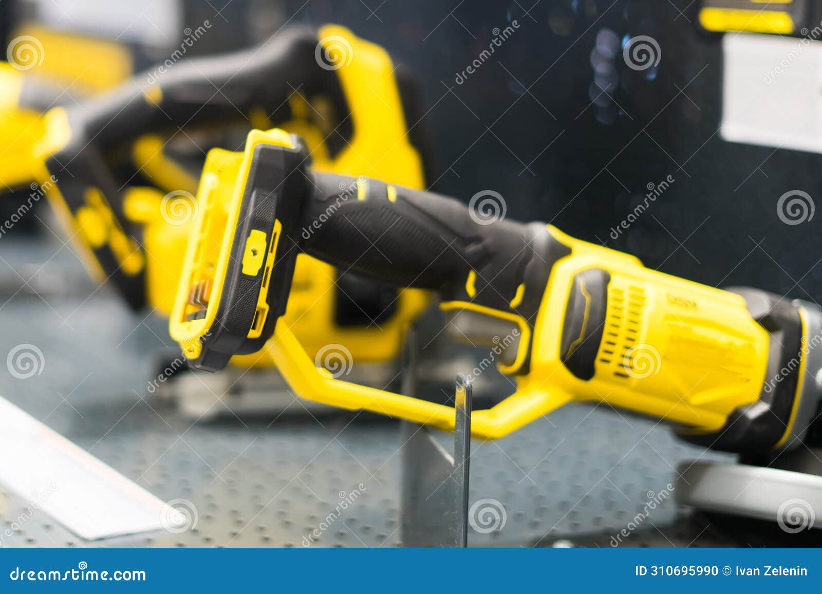 power tools, drills and hammers of various manufacturers are sold in a hardware store.