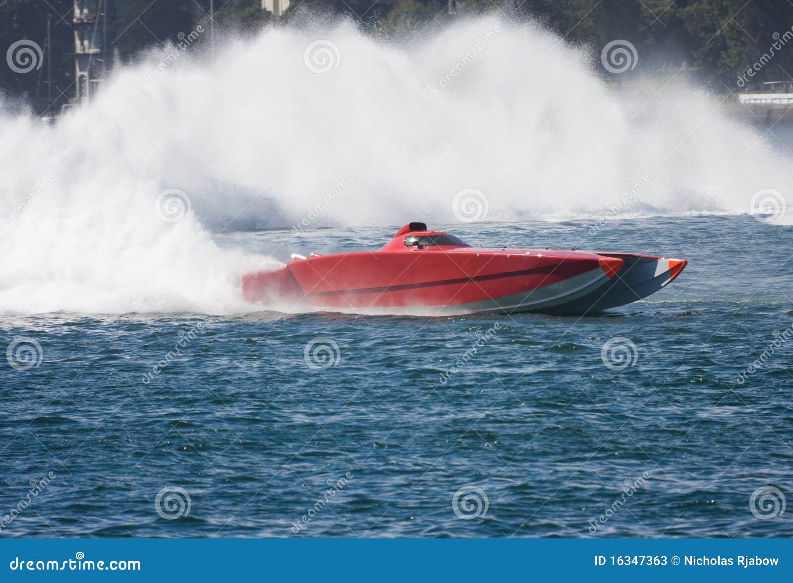 powerboat approaching large vessel