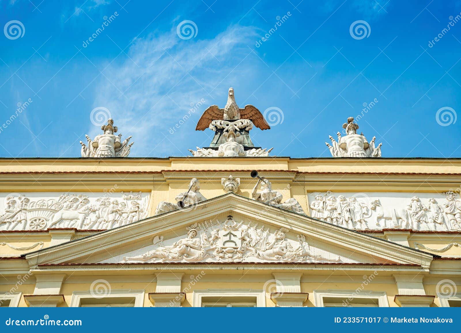 poznan, poland - august 09, 2021. statues on the roof of kornicka library - biblioteka kornicka in palac dzialynskich with protect