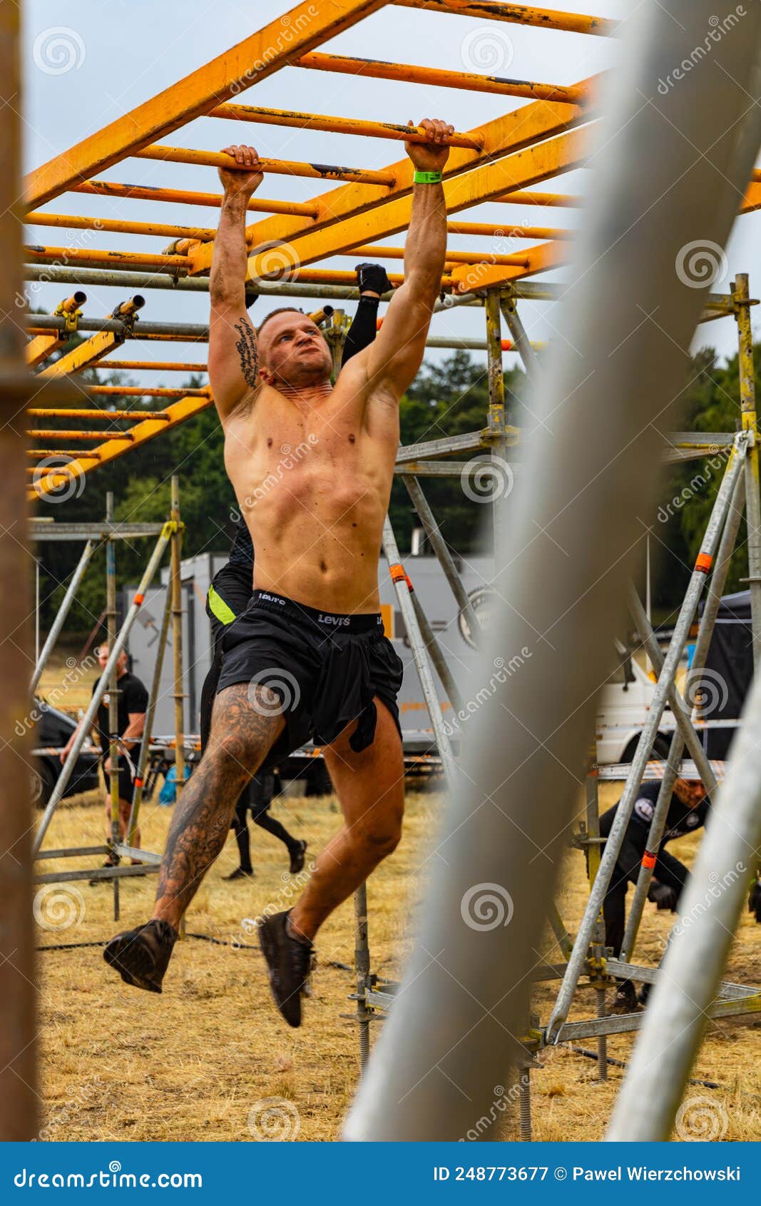 An Hard Extreme Obstacle Course Survival Race at Rainy Day Editorial An Hard Extreme Obstacle Course Survival Race at Rainy Day Editorial