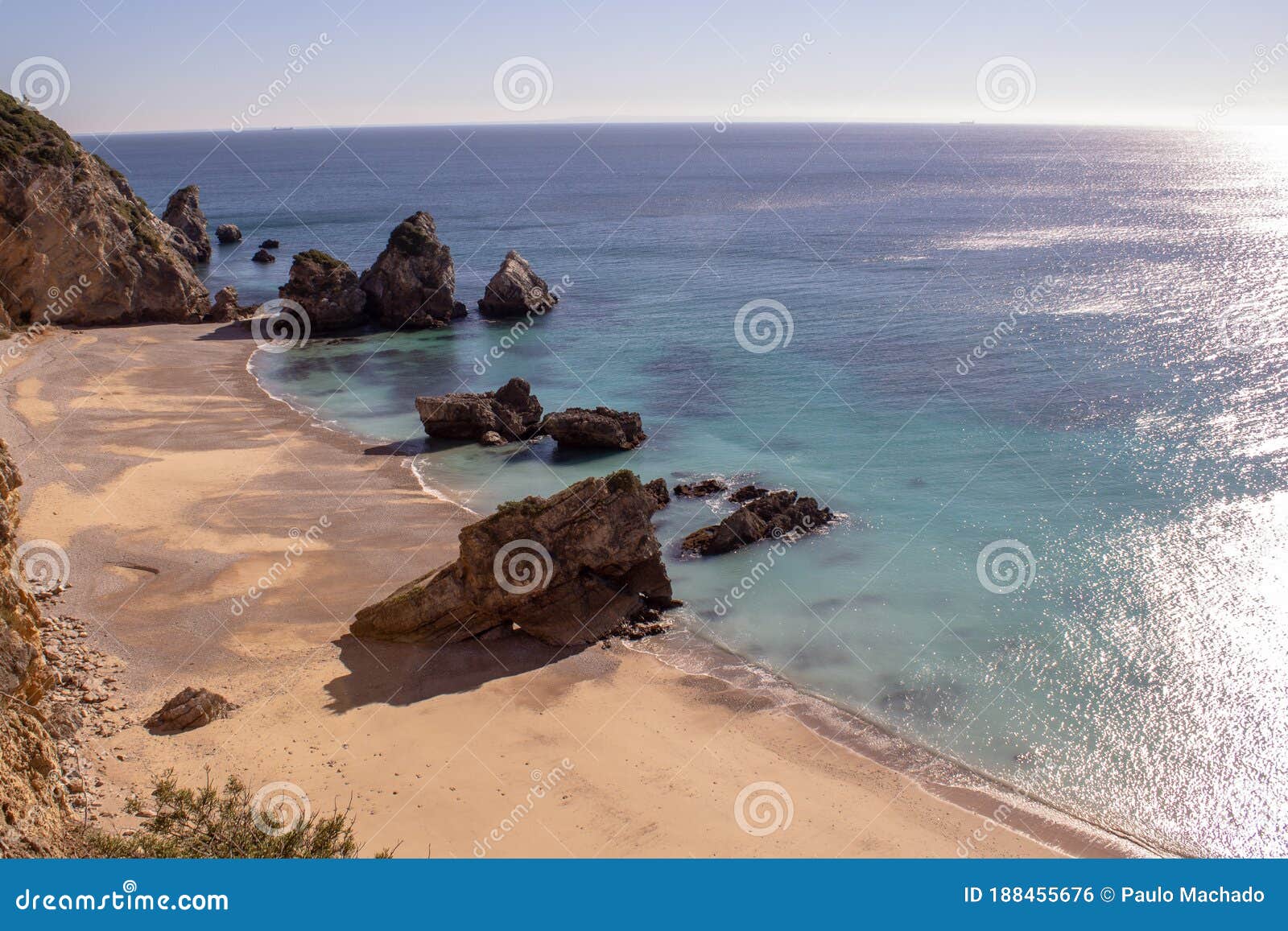 praia ribeira do cavalo, a hidden beach of crystal clear blue waters near the town of sesimbra