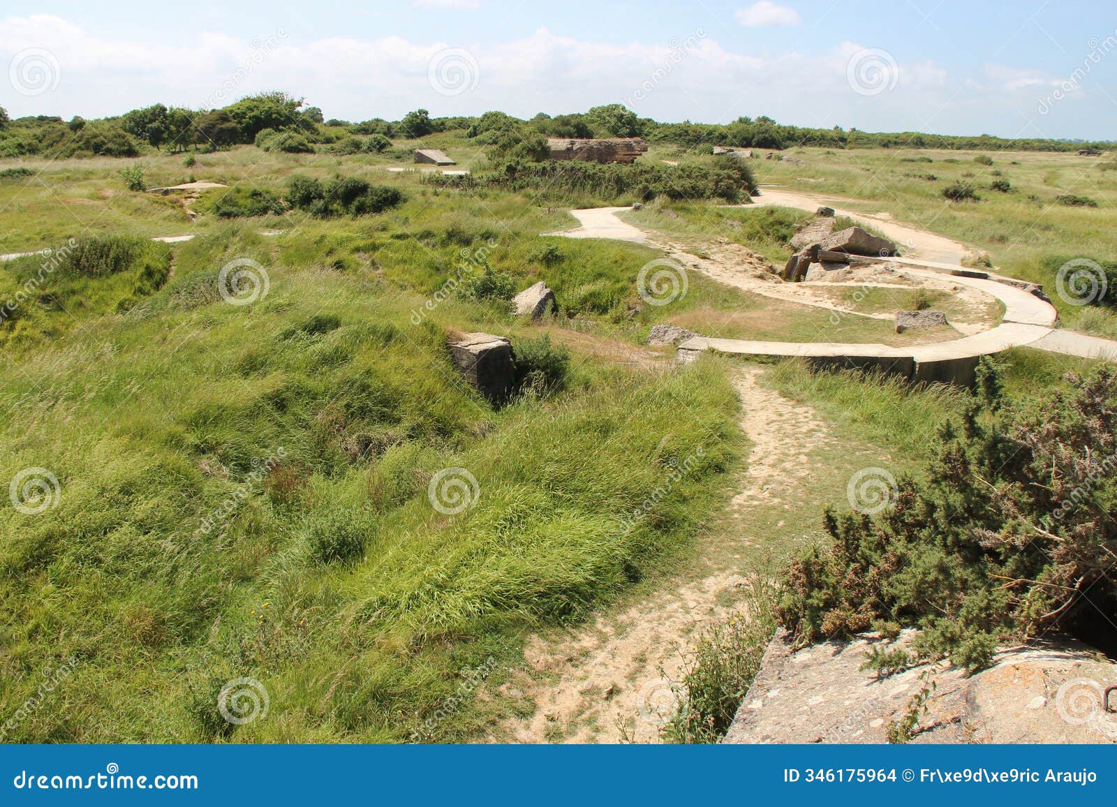 prairie and ruined bunkers at the pointe du hoc in normandy - france