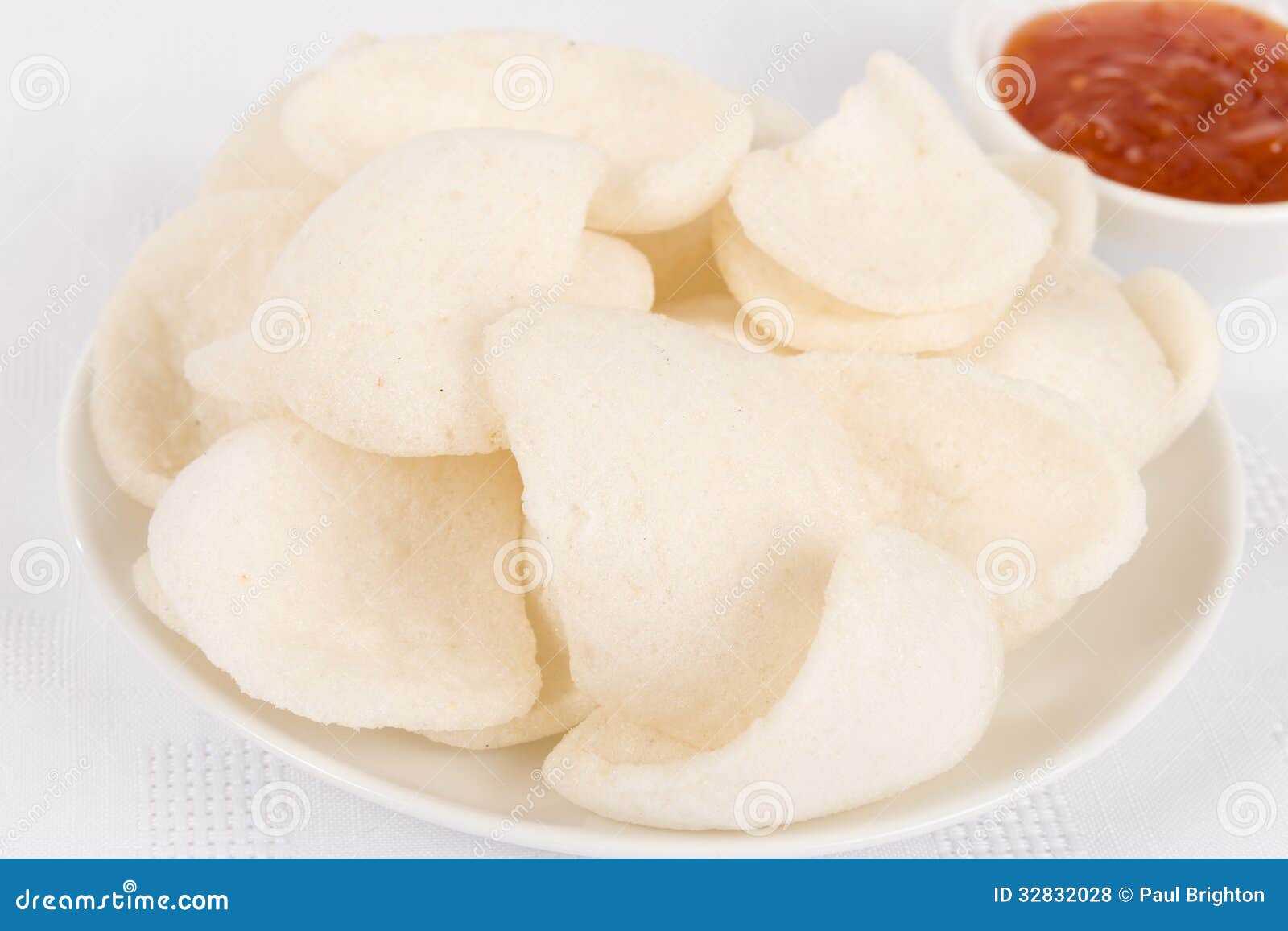 prawn-crackers-oriental-fried-crisps-sweet-chilli-sauce-dip-white-background-32832028.jpg